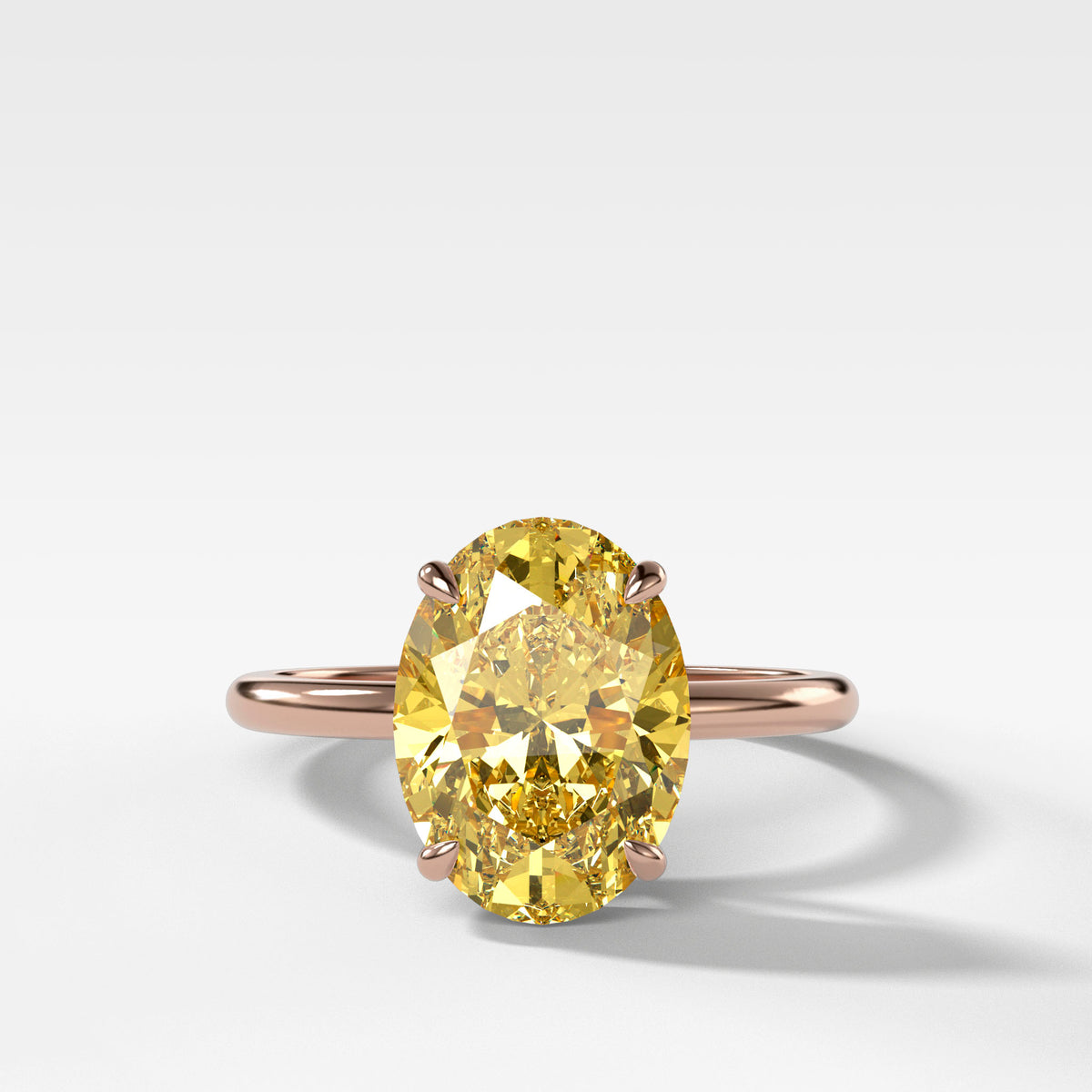 Thin + Simple Solitaire Engagement Ring With Canary Yellow Oval Cut Diamond