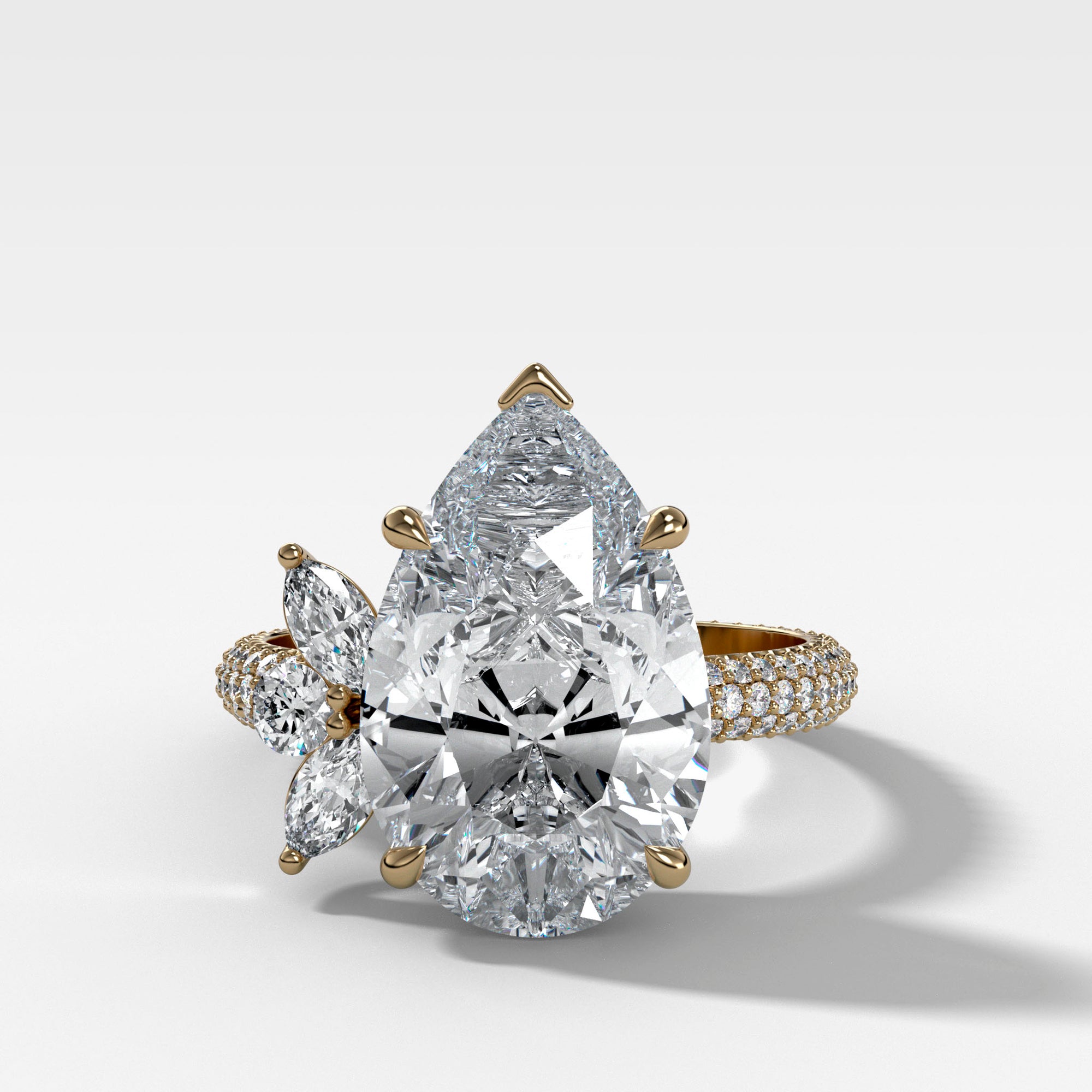 Lotus Triple Row Pavé Engagement Ring With Pear Cut Diamond