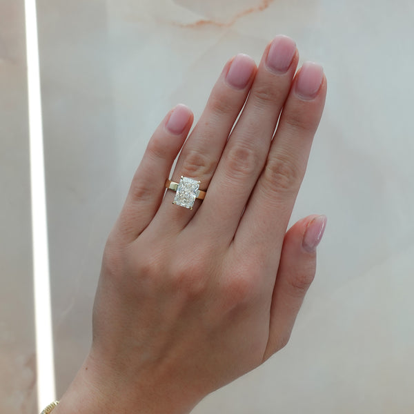 Finest Solitaire Engagement Ring With Elongated Radiant Cut