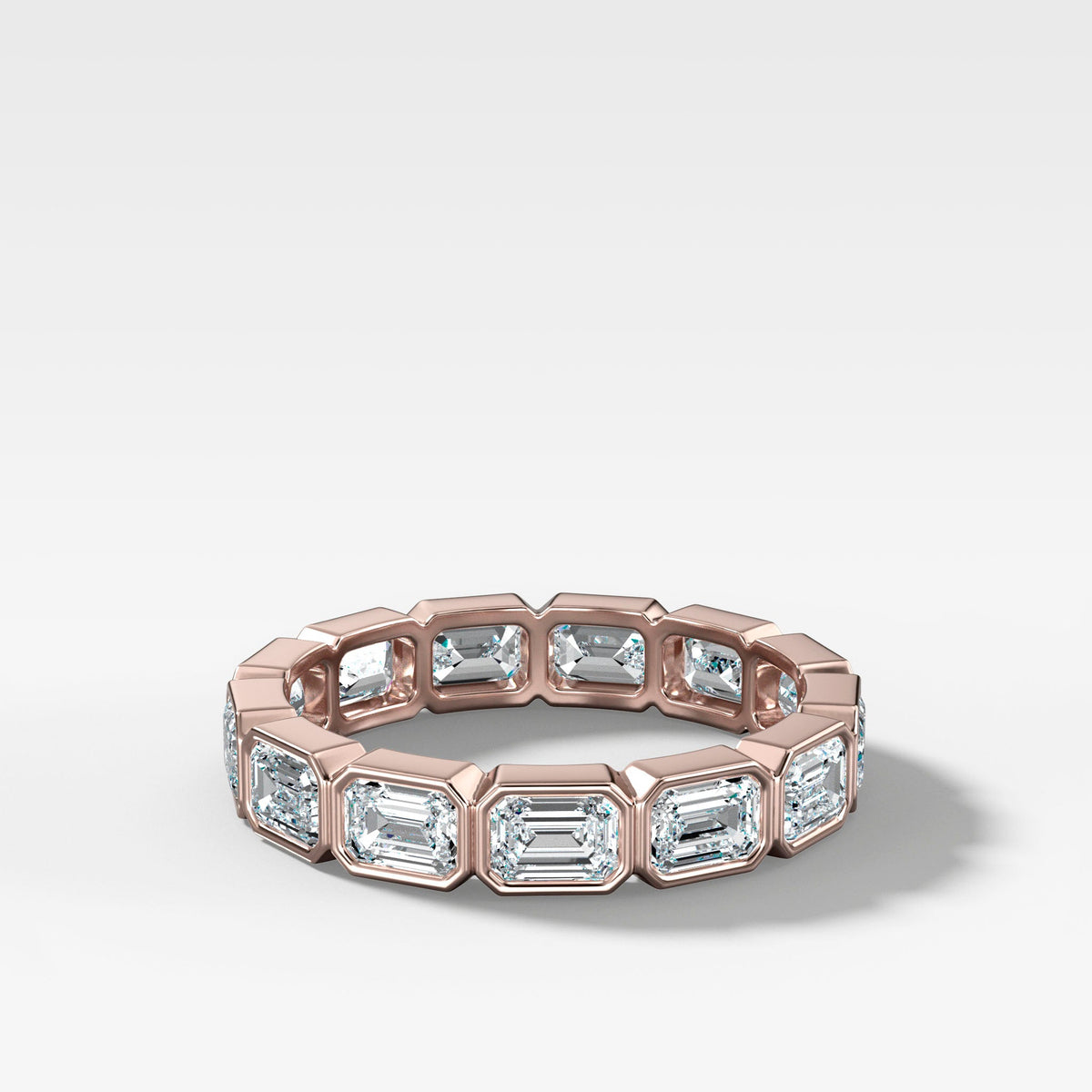 Midi Bezel Set Eternity Band With East West Emerald Cuts in Rose Gold by Good Stone