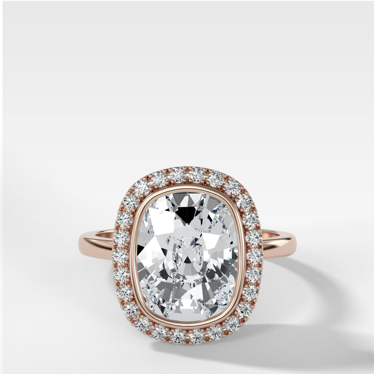 Bezel Set Halo Engagement Ring With Elongated Cushion Cut by Good Stone in Rose Gold