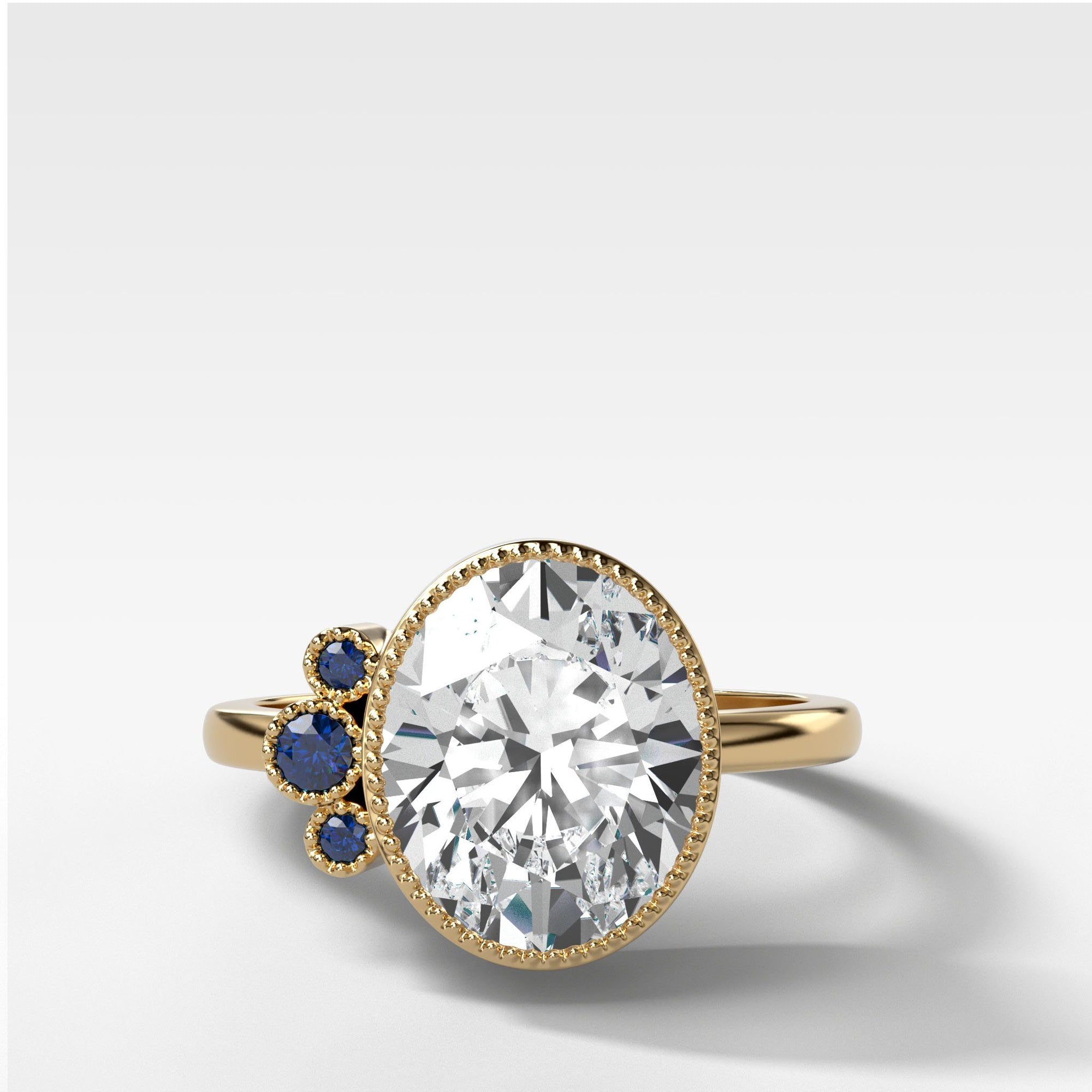 Blue Cluster Engagement Ring With Oval Cut by Good Stone in Yellow Gold