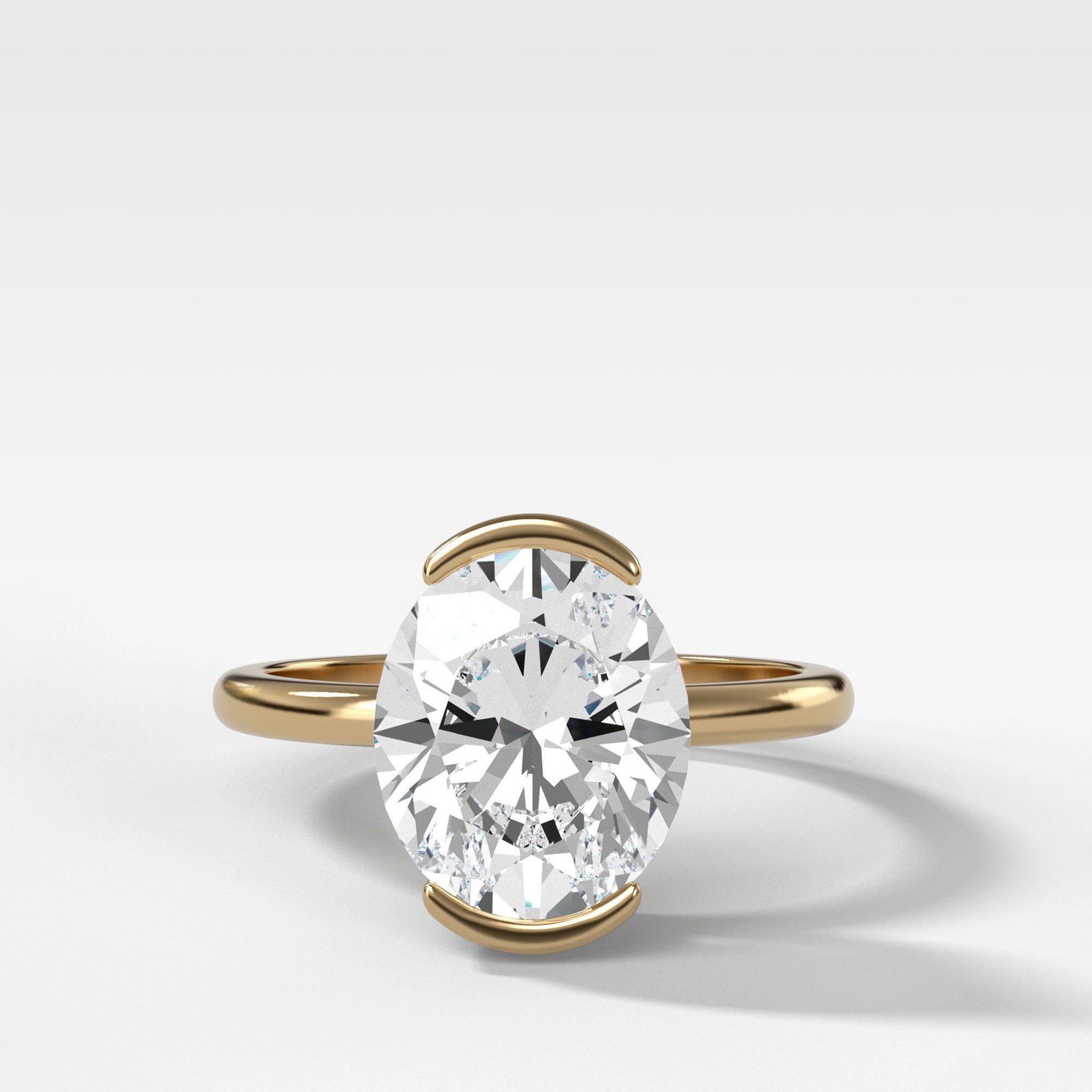 North South Half Bezel Solitaire Engagement Ring With Oval Cut by Good Stone in Yellow Gold