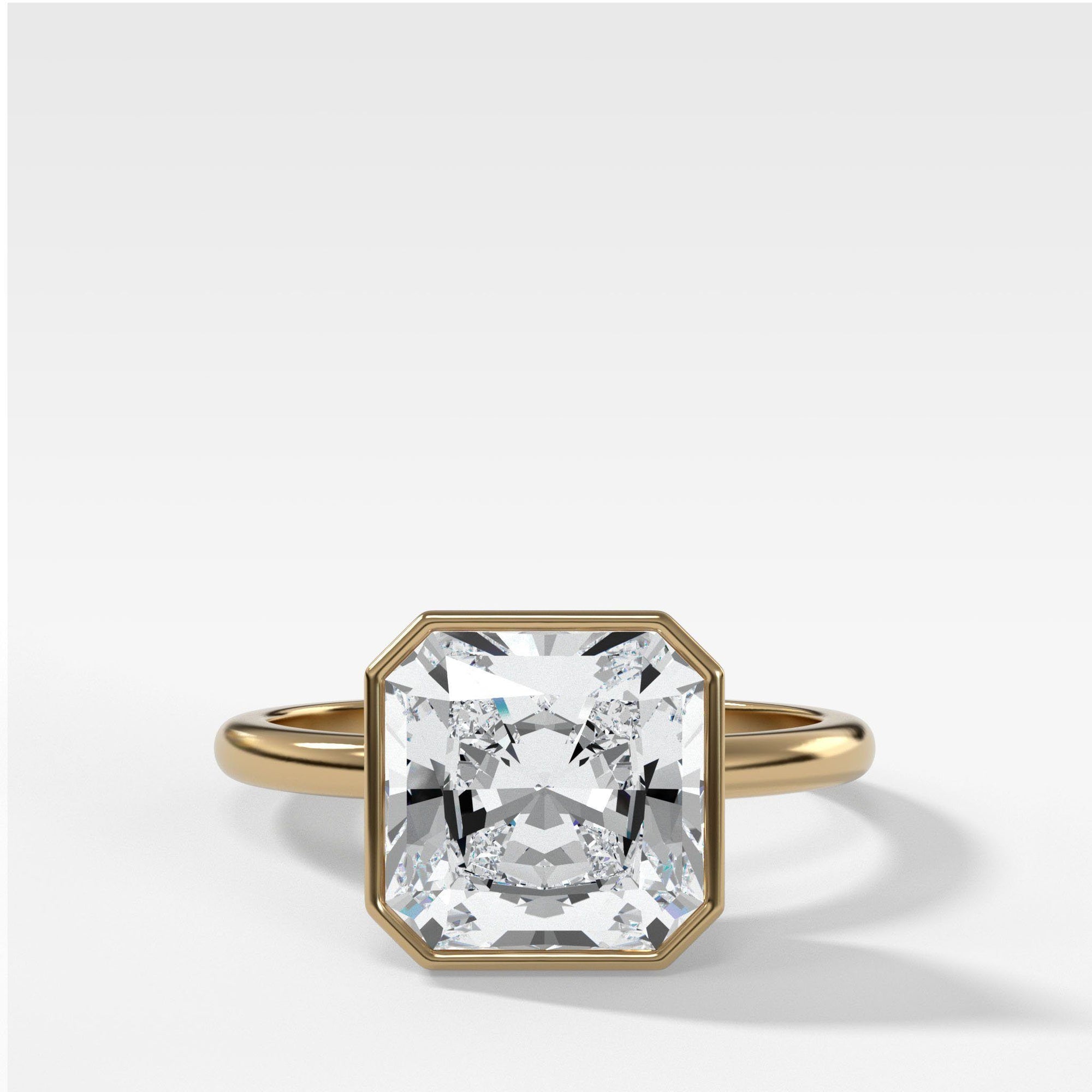 Bezel Penumbra Solitaire With Radiant Square Cut by Good Stone in Yellow Gold