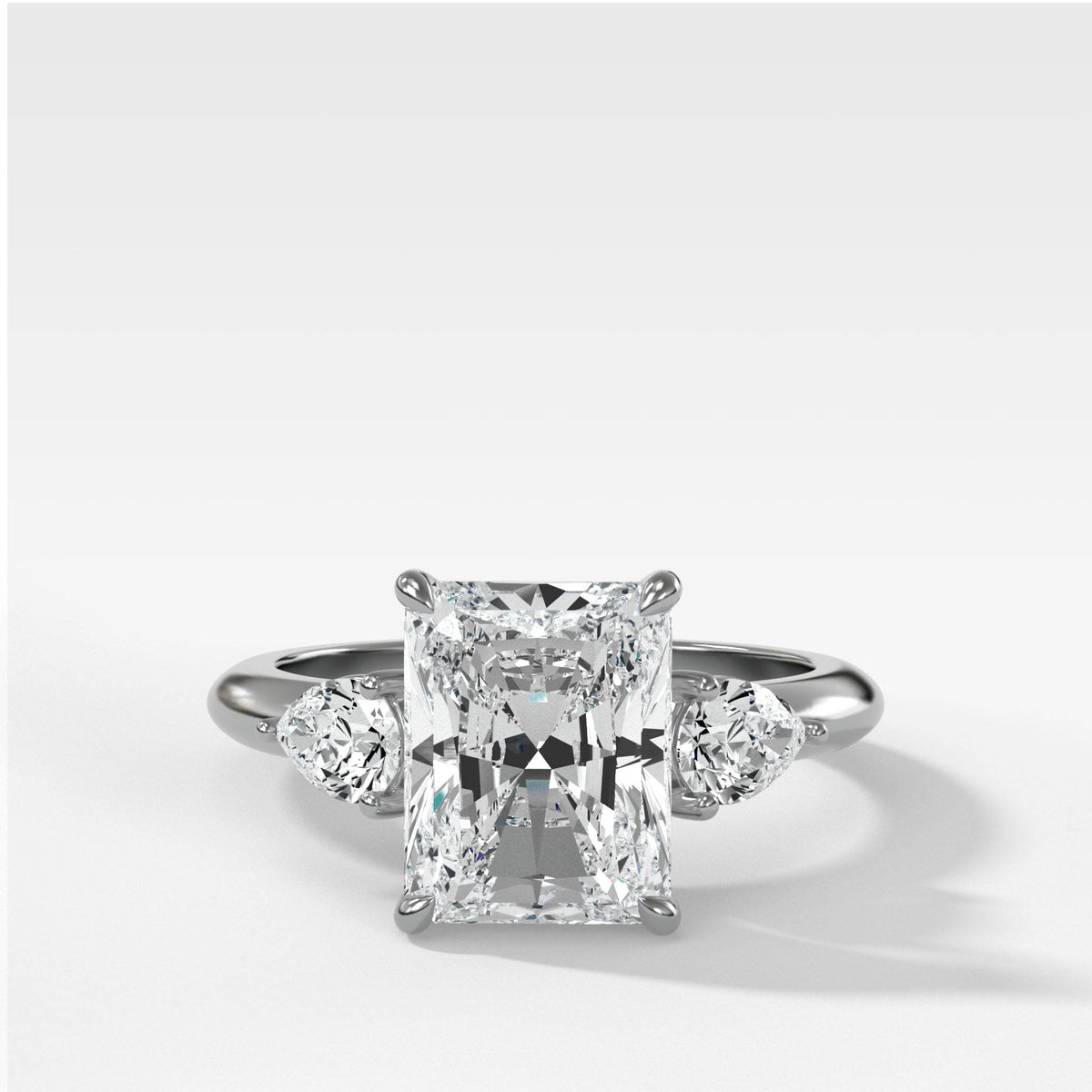 Three Stone Engagement Ring With Pear Side Stones and Radiant Cut by Good Stone in White Gold