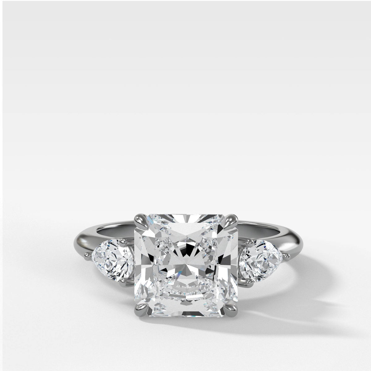 Three Stone Engagement Ring With Pear Side Stones and Radiant Square Cut by Good Stone in White Gold