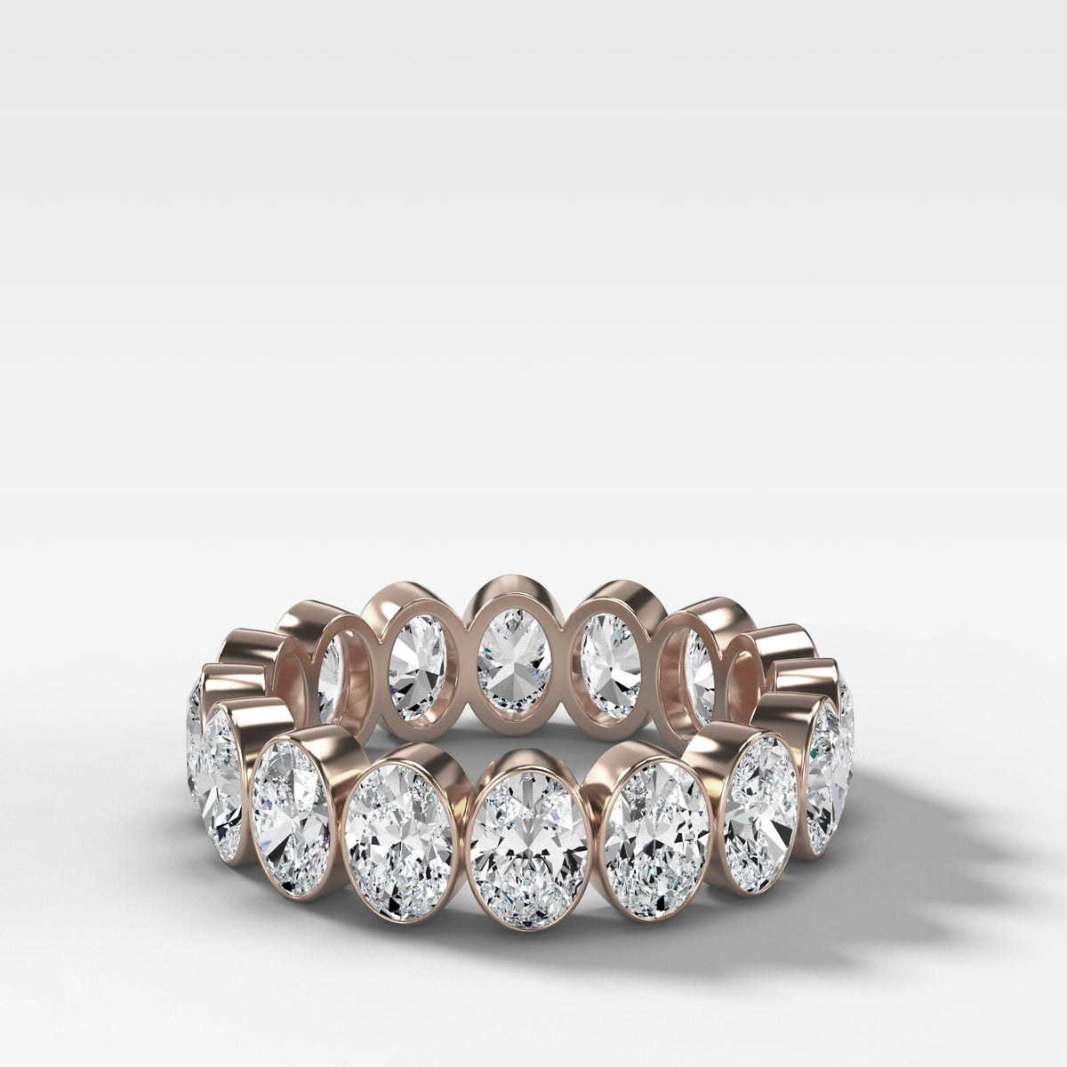 Bezel Set Eternity Band With Oval Cuts by Good Stone in Rose Gold