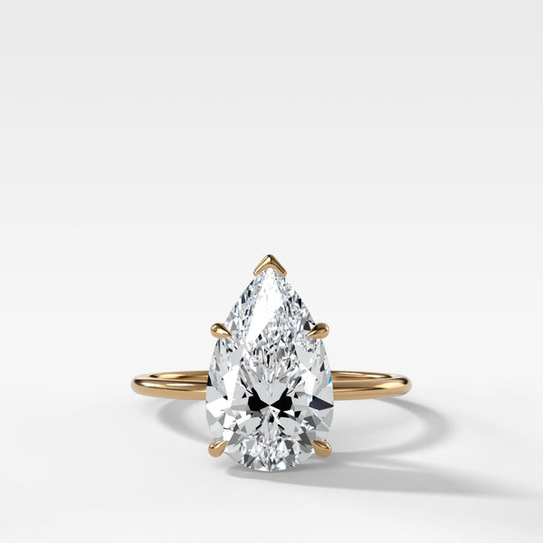 Thin Simple Solitaire Engagement Ring With Pear Cut Diamond
