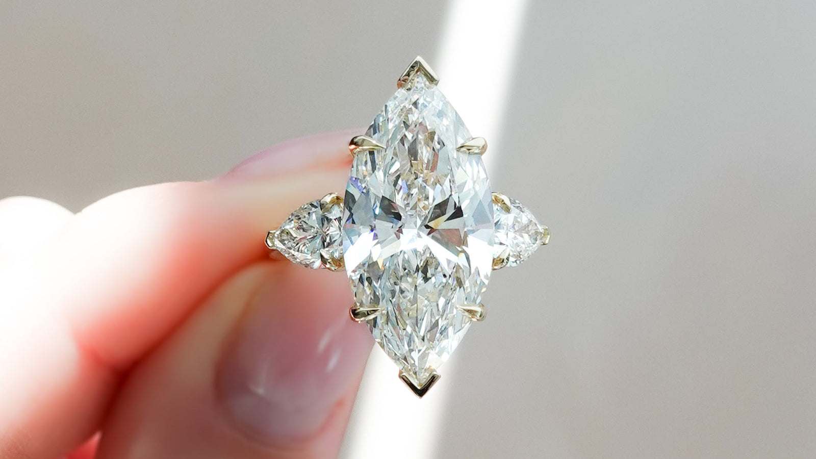 Three Stone with Pear Side Stones