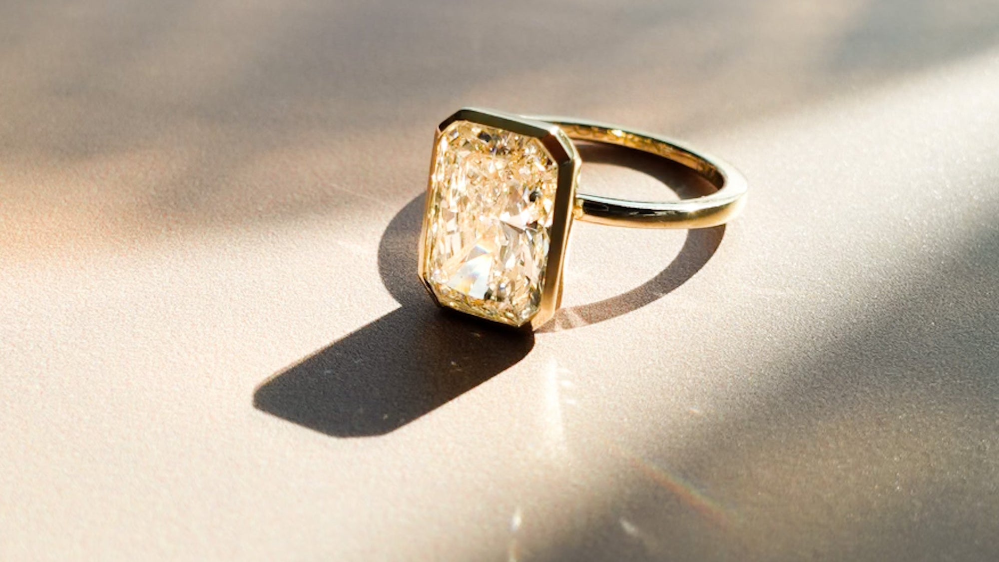 Penumbra Bezel Set Engagement rings