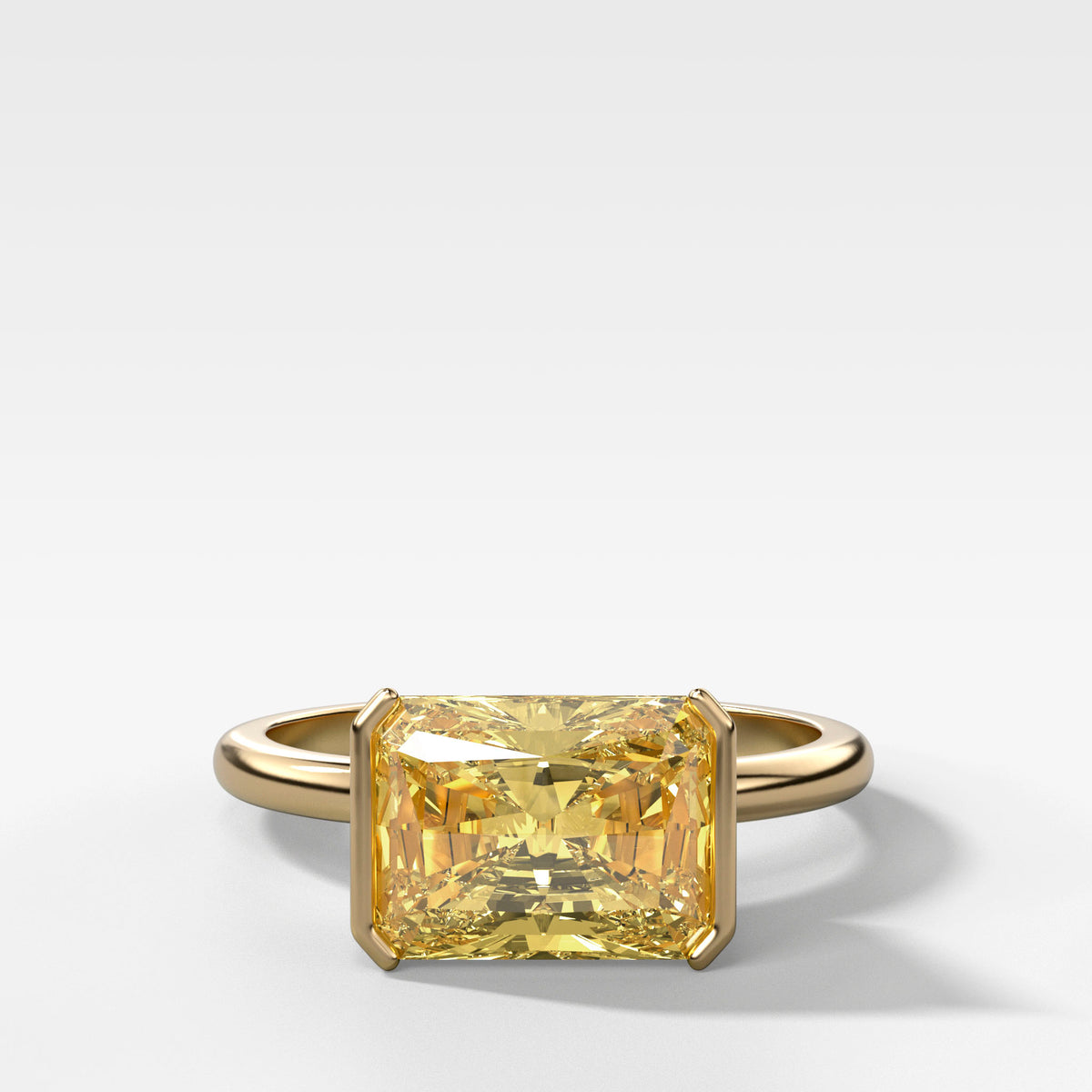 East West Half Bezel Solitaire Engagement Ring With Canary Yellow Elongated Radiant Cut Diamond