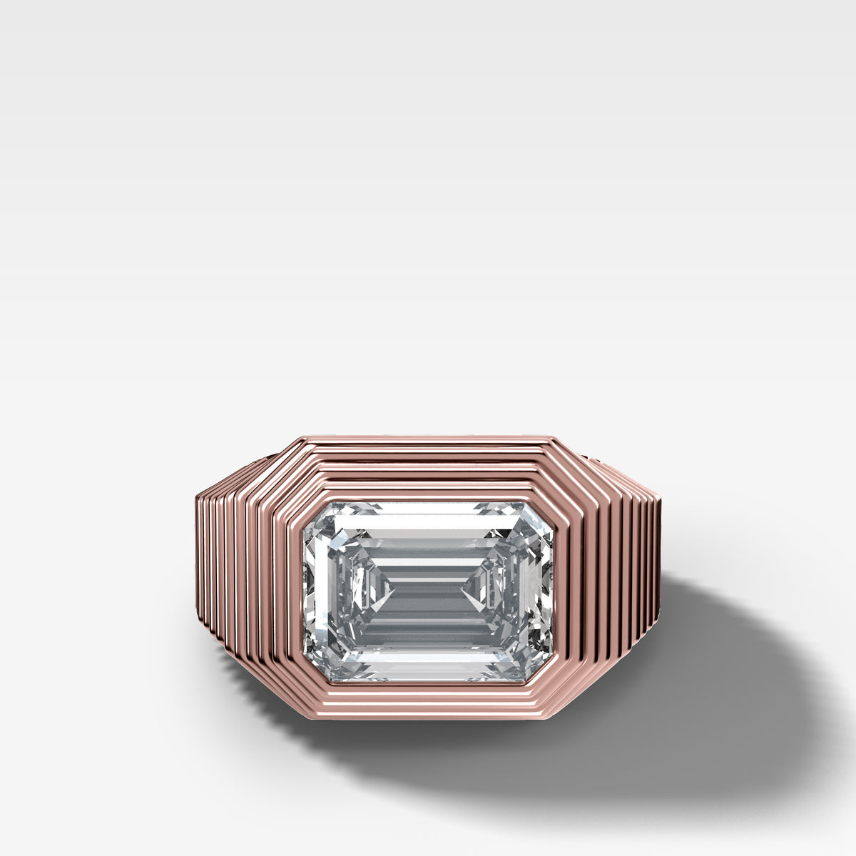 Ripple Solitaire Engagement Ring with East West Emerald Cut Diamond