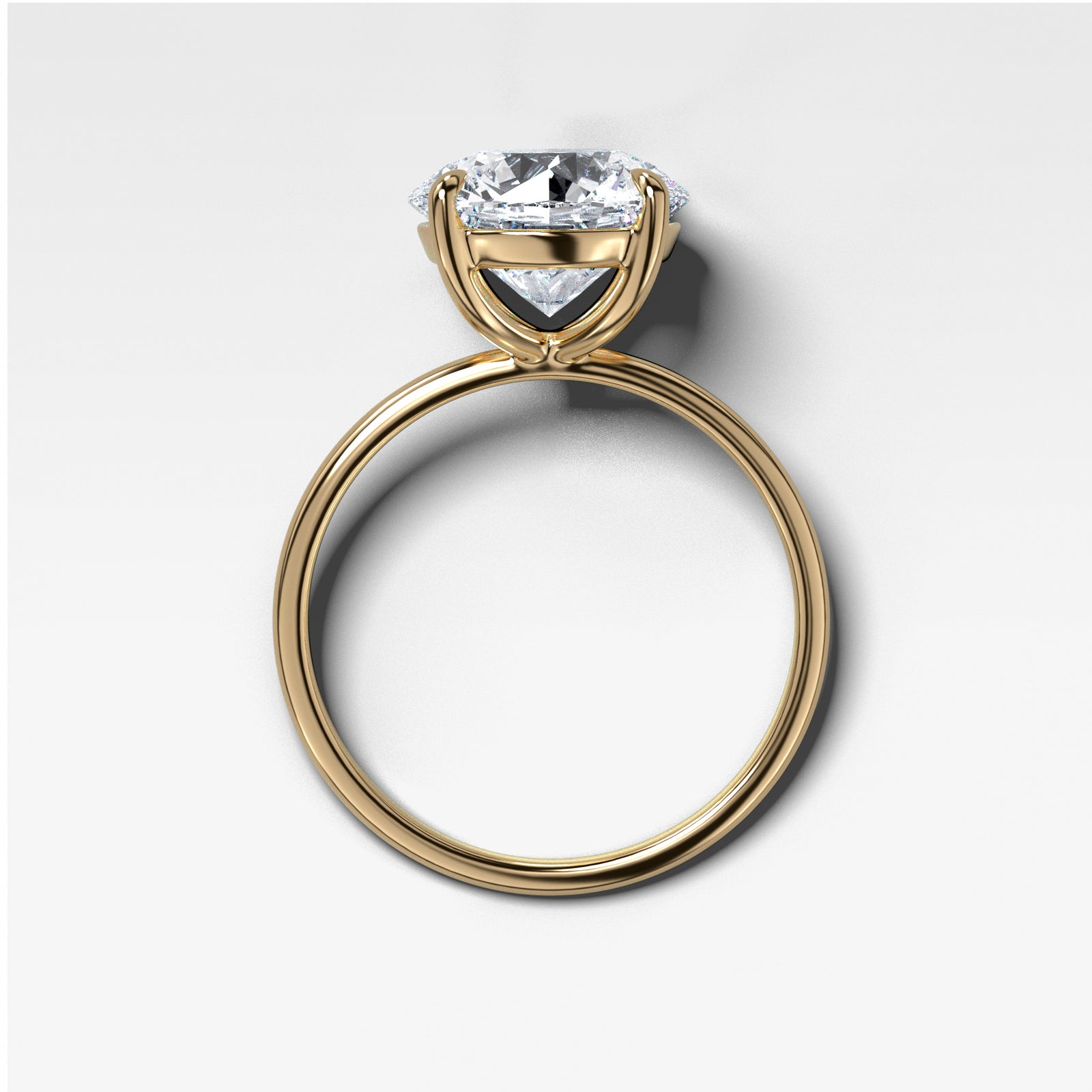 Crescent Solitaire With Round Cut by Good Stone in Yellow Gold