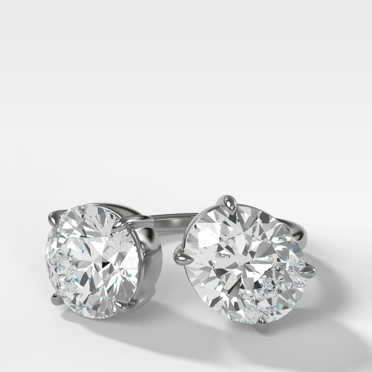 Floating Toi et Moi Engagement Ring with Oval and Round Cut Diamonds