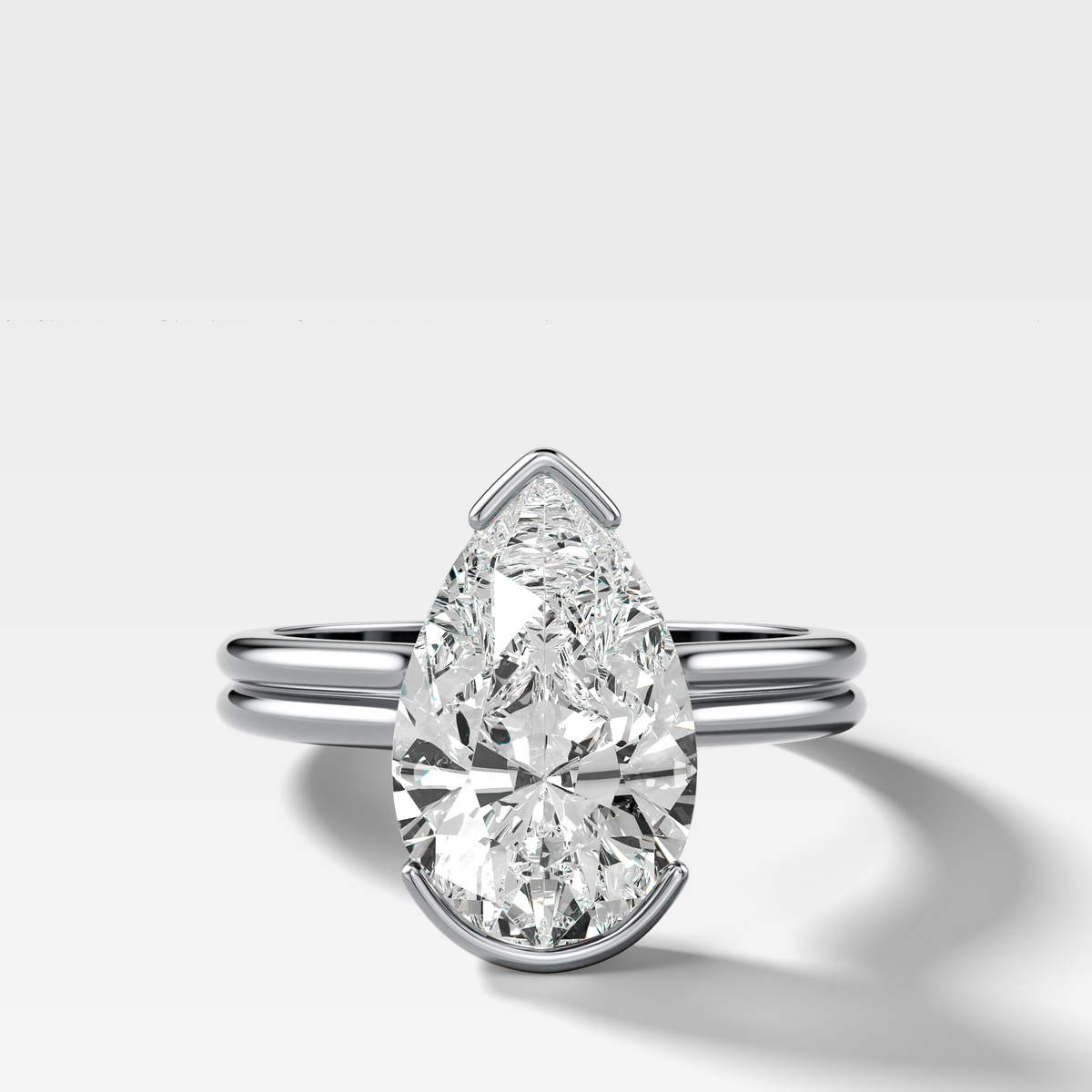 Double Row North South Half Bezel Solitaire Engagement Ring With Pear Cut Diamond