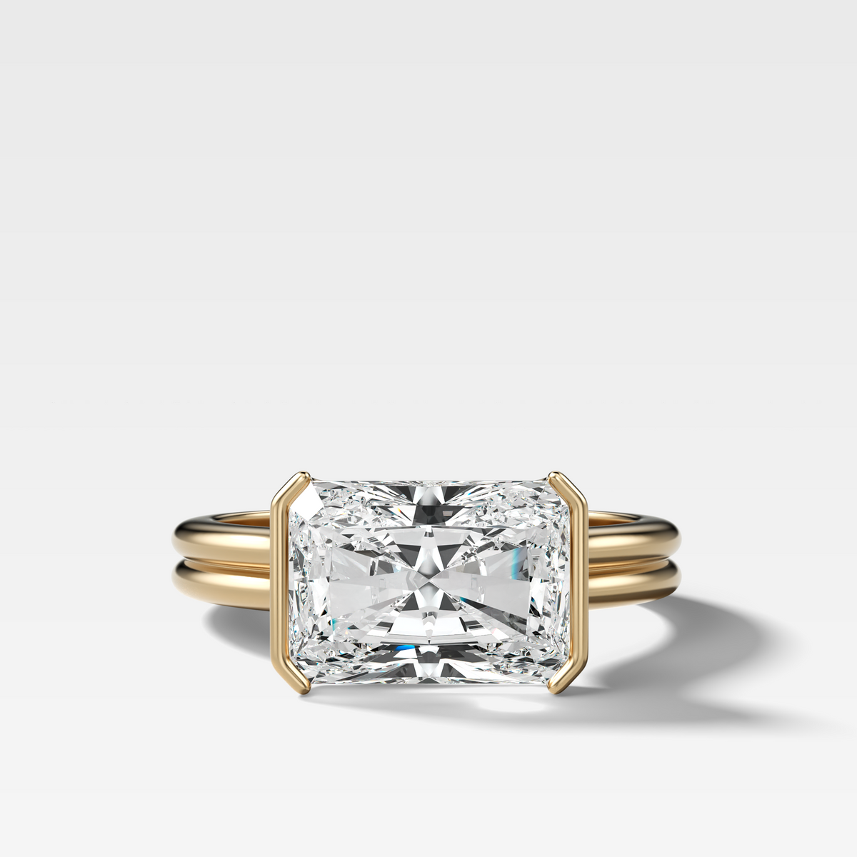 Double Row East West Half Bezel Solitaire Engagement Ring With Elongated Radiant Cut Diamond