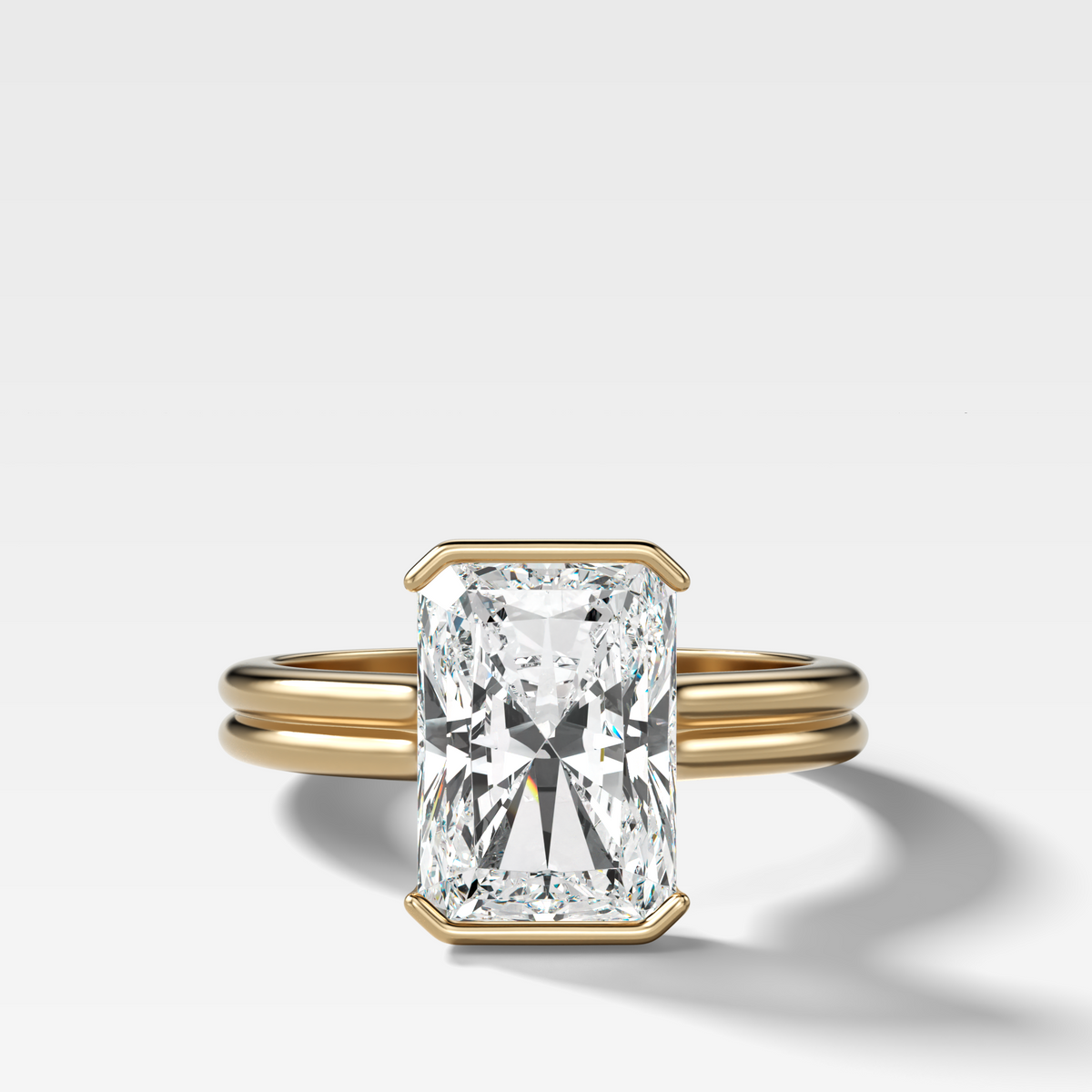 Double Row Half Bezel Solitaire Engagement Ring With Elongated Radiant Cut Diamond