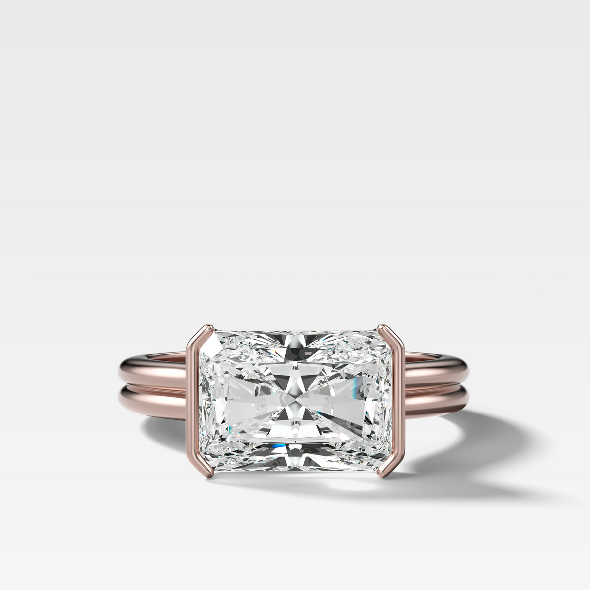 Double Row East West Half Bezel Solitaire Engagement Ring With Elongated Radiant Cut Diamond