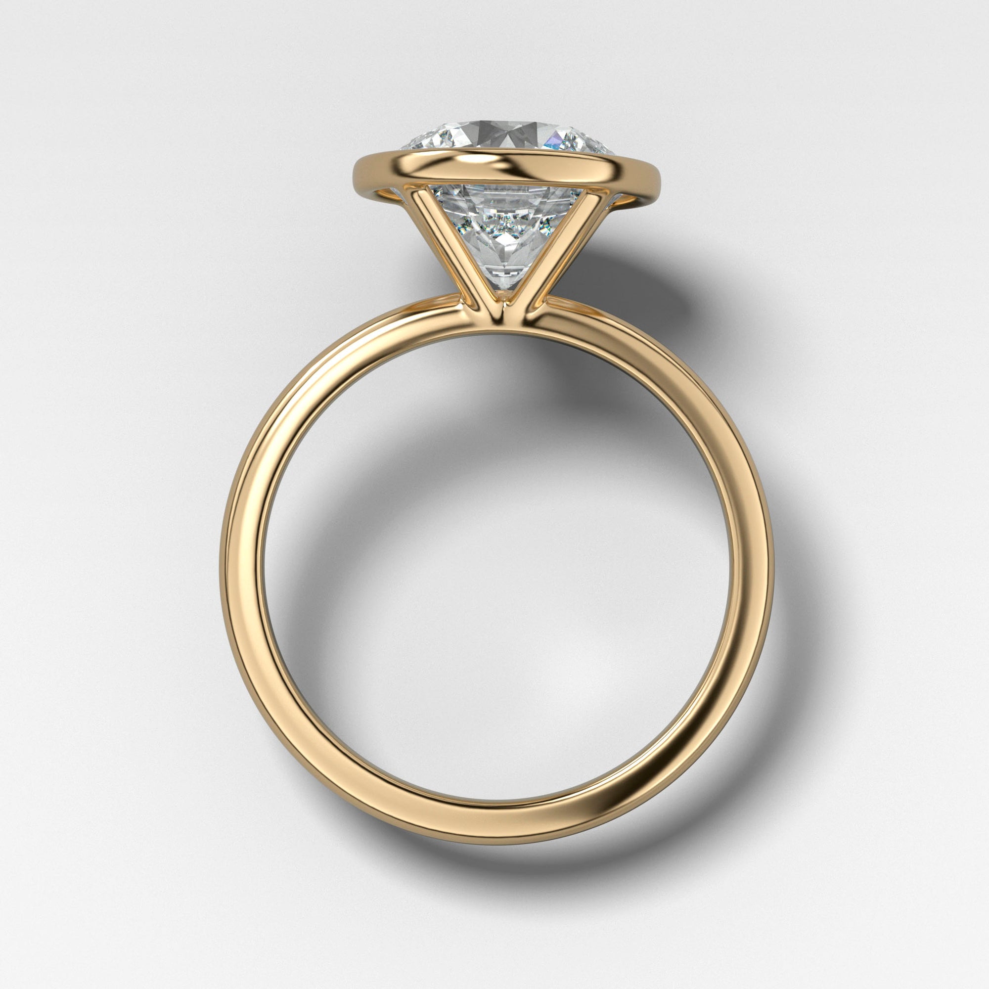 Bezel Penumbra Solitaire With Round Cut by Good Stone in Yellow Gold