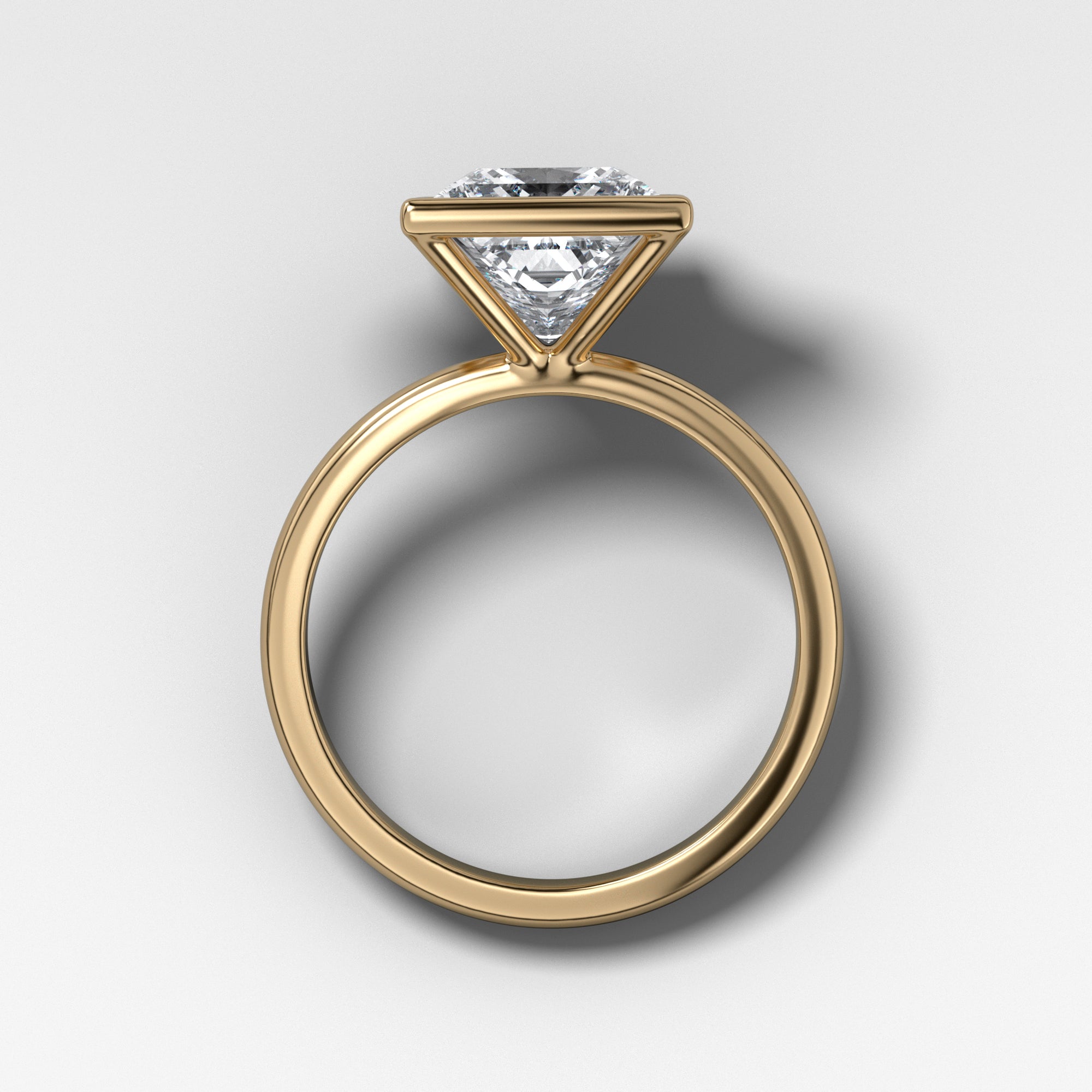 Bezel Penumbra Solitaire With Princess by Good Stone in Yellow Gold