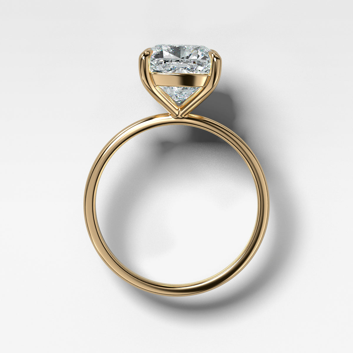 Thin + Simple Solitaire Engagement Ring With Cushion Cut Diamond
