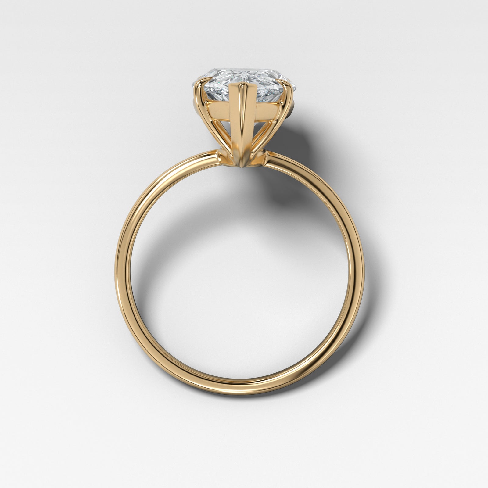 Crescent Solitaire With Pear Cut by Good Stone in Yellow Gold