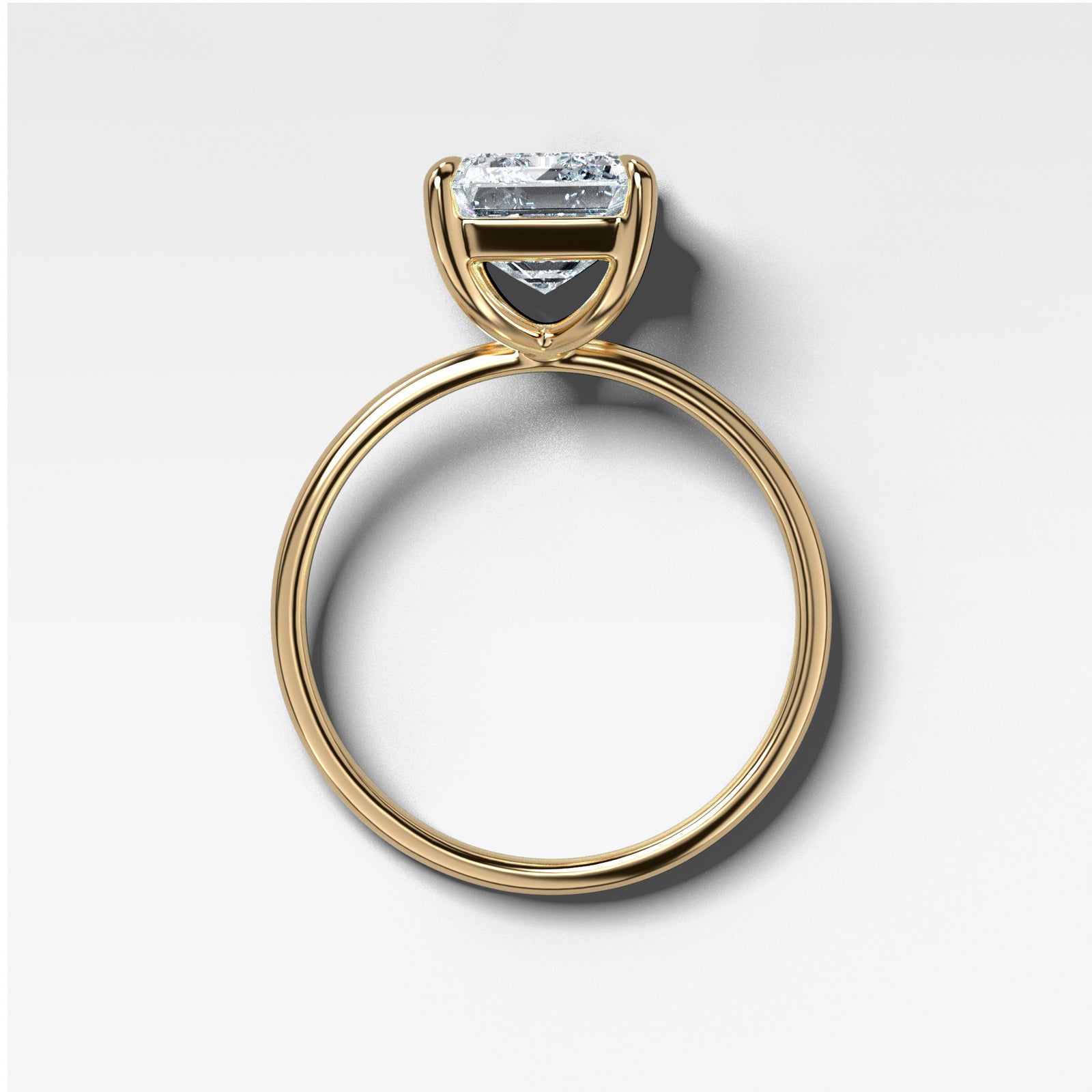 Thin + Simple Solitaire With Emerald Cut by Good Stone in Yellow Gold