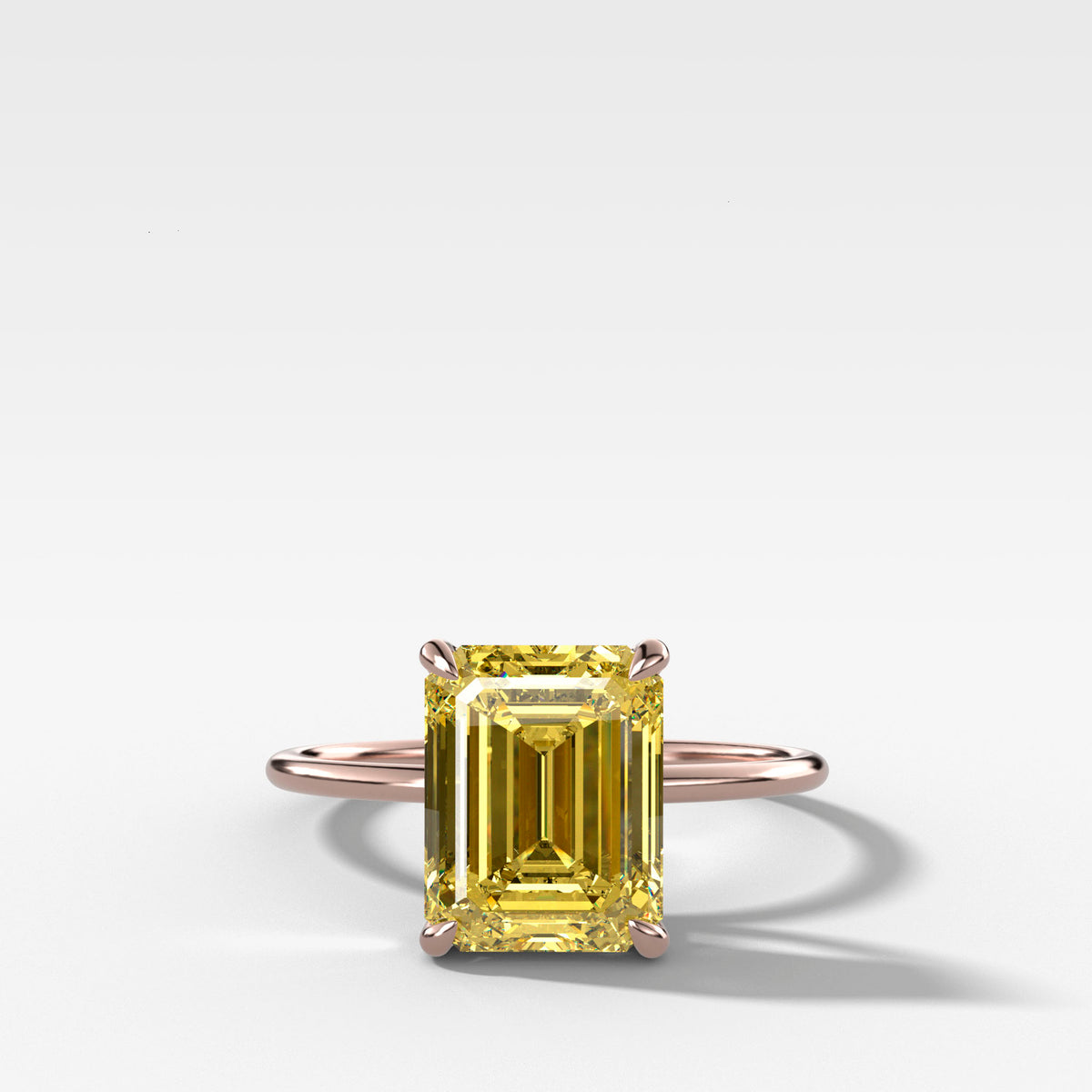 Thin + Simple Solitaire Engagement Ring With Canary Yellow North South Emerald Cut Diamond