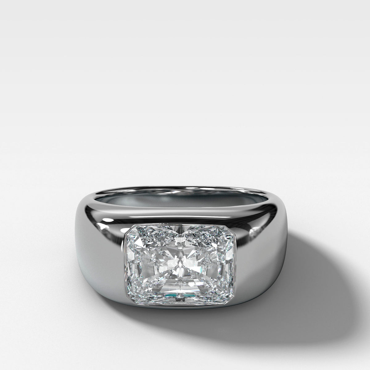 Burnished Solitaire Engagement Ring with Elongated Radiant Cut Diamond