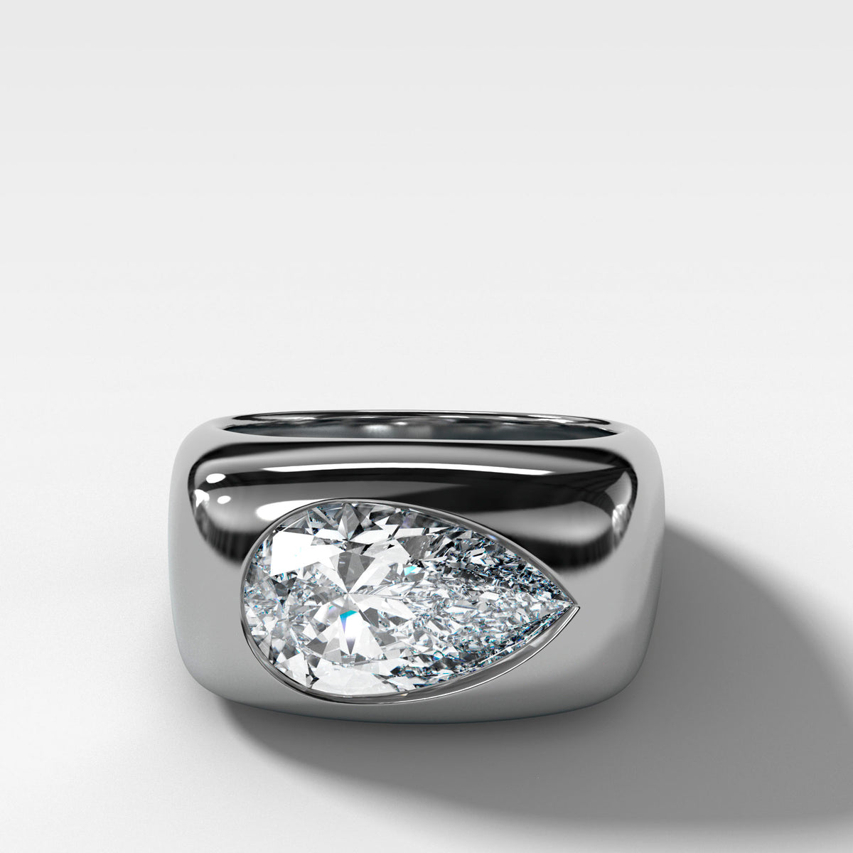 Burnished Solitaire Engagement Ring with Pear Cut Diamond