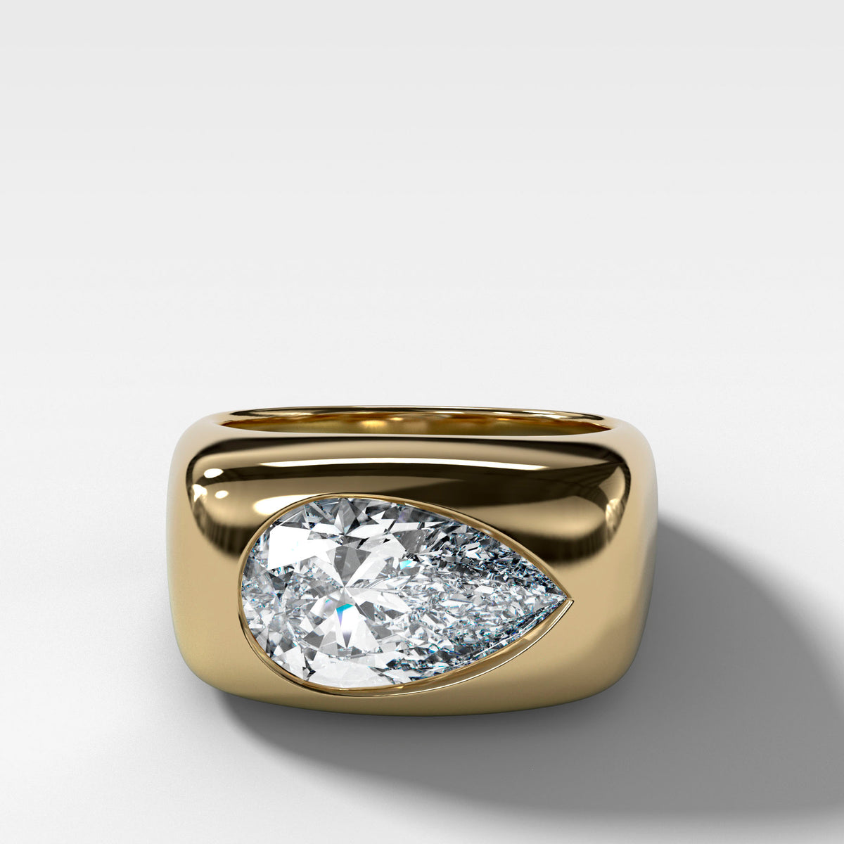 Burnished Solitaire Engagement Ring with Pear Cut Diamond