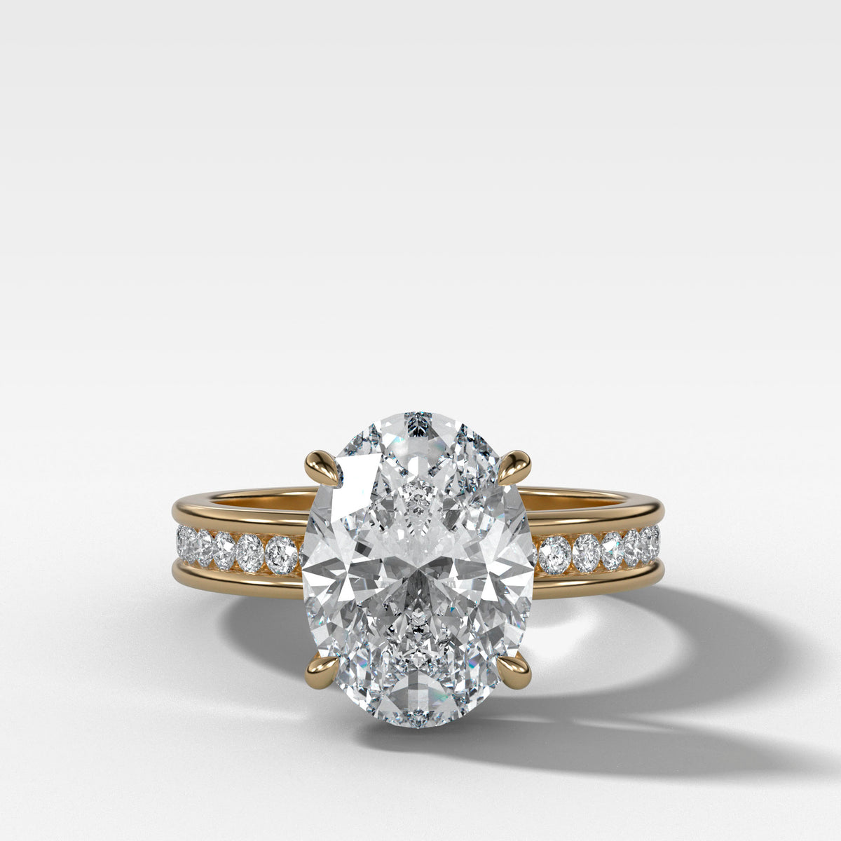 Petite Channel Set Engagement Ring with Oval Cut Diamond