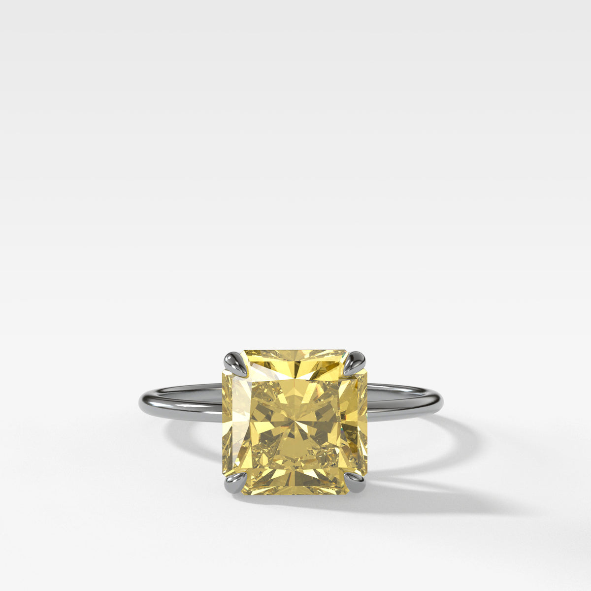 Thin + Simple Solitaire Engagement Ring With Canary Yellow Radiant Cut Diamond