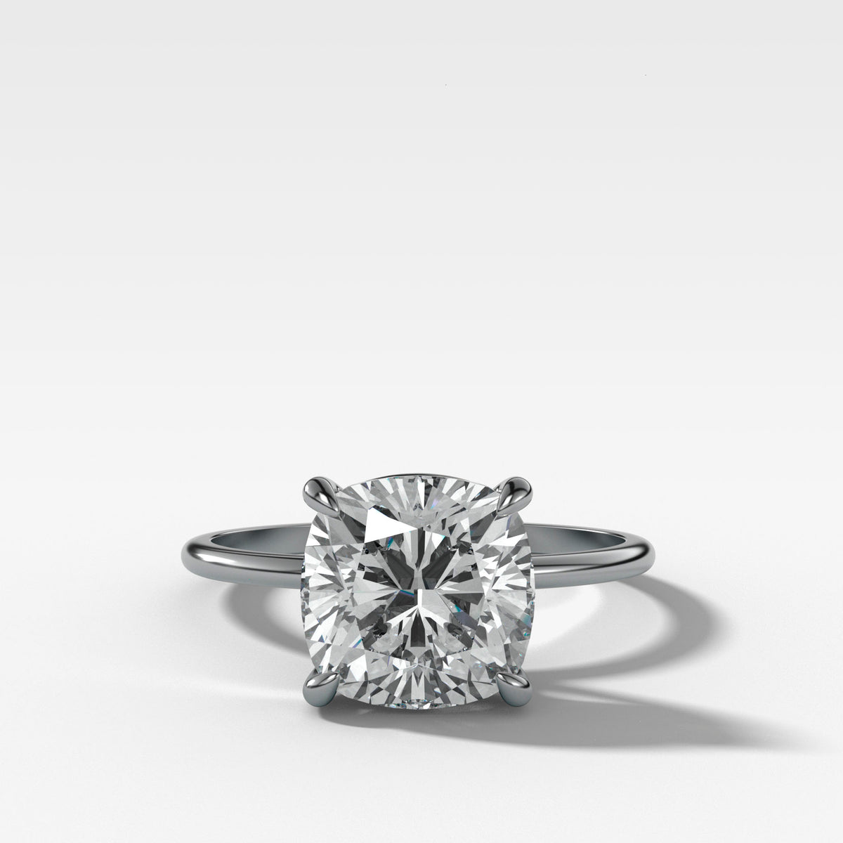 Thin + Simple Solitaire Engagement Ring With Cushion Cut Diamond