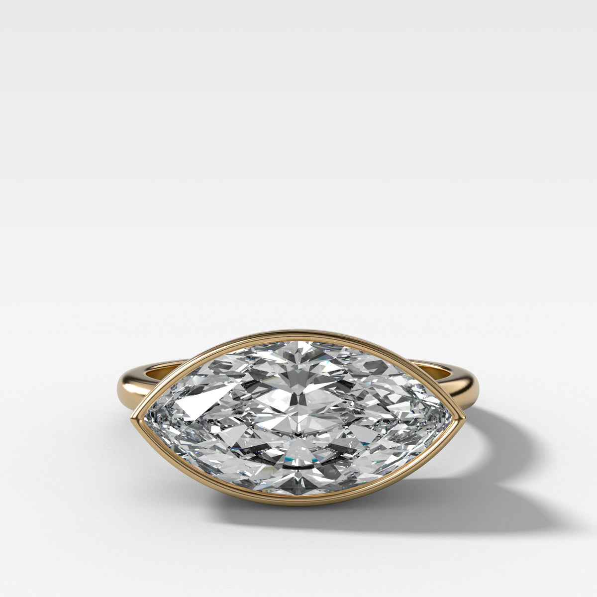 Penumbra Bezel Set Engagement Ring With East West Marquise Cut