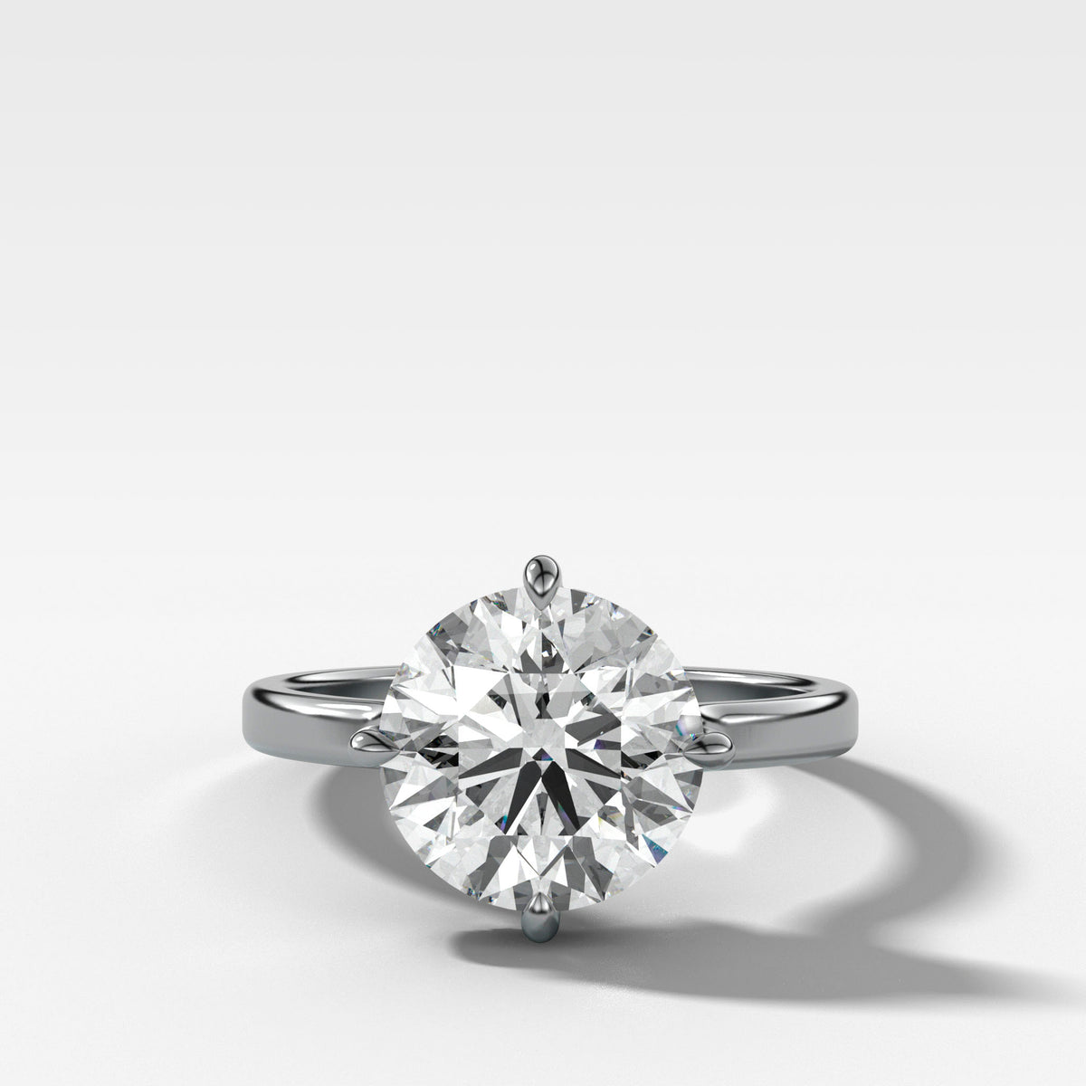 Compass Solitaire Engagement Ring with Round Cut Diamond