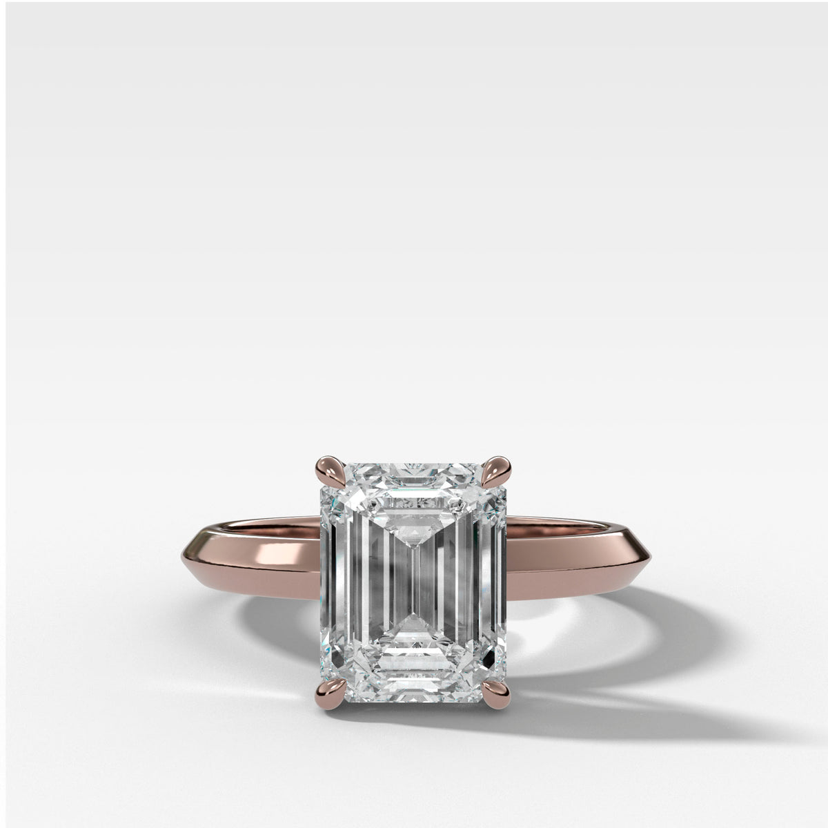 Butter Knife Solitaire Engagement Ring With Emerald Cut Diamond
