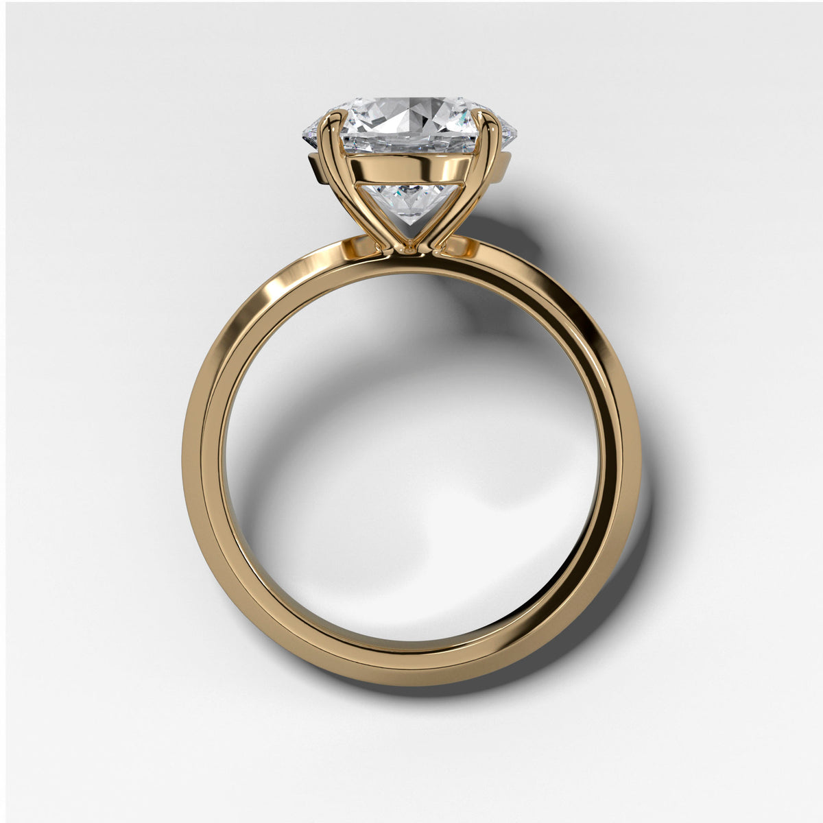Butter Knife Solitaire Engagement Ring With Round Cut Diamond