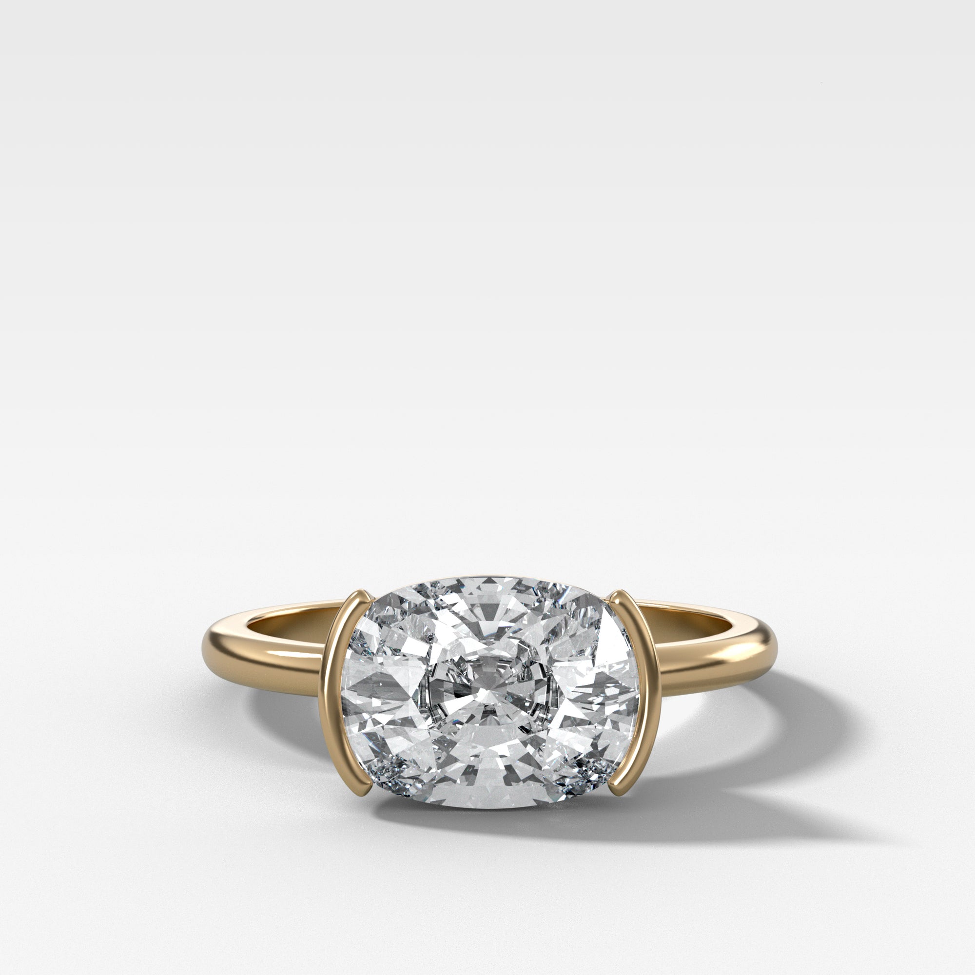 East West Half Bezel Solitaire Engagement Ring With Elongated Cushion ...