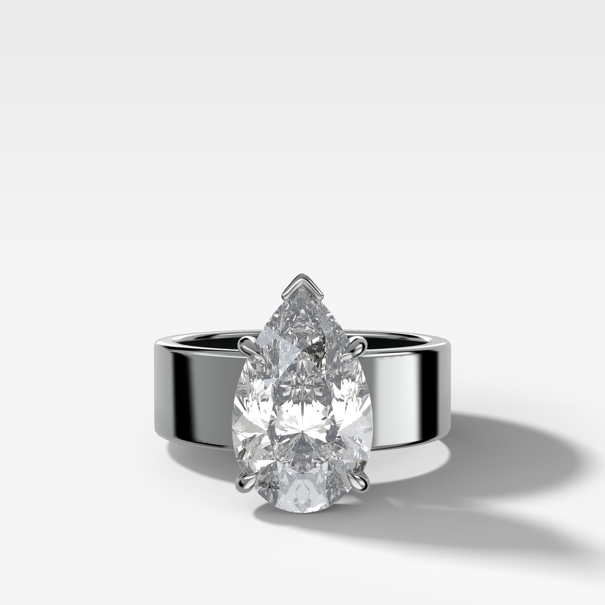 Finest Cigar Band Engagement Ring with Pear Cut Diamond
