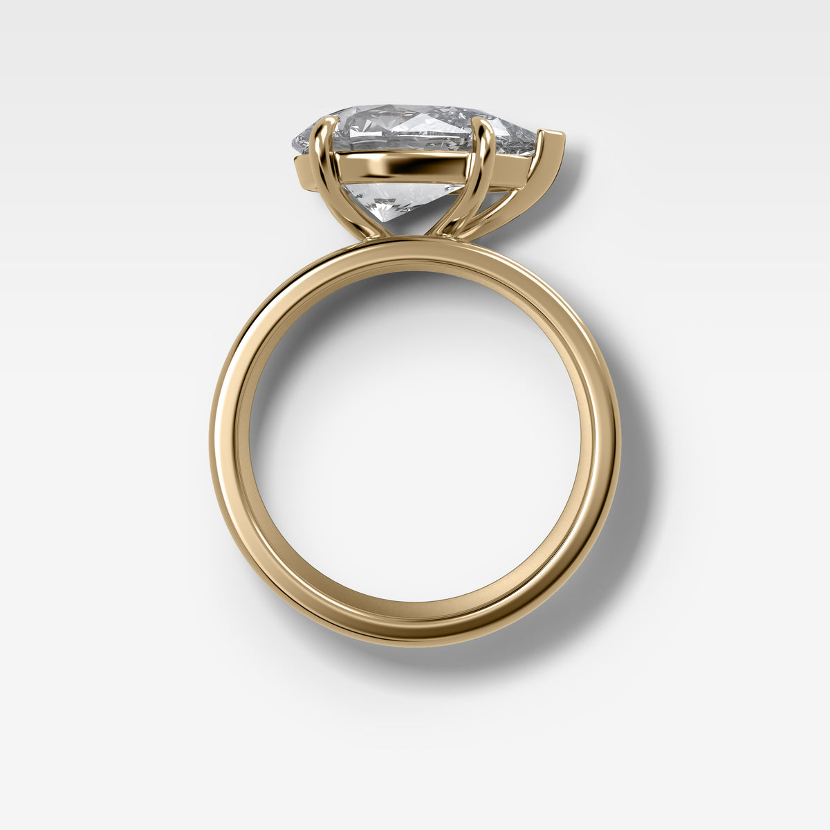 Finest Cigar Band Engagement Ring with East West Pear Cut Diamond