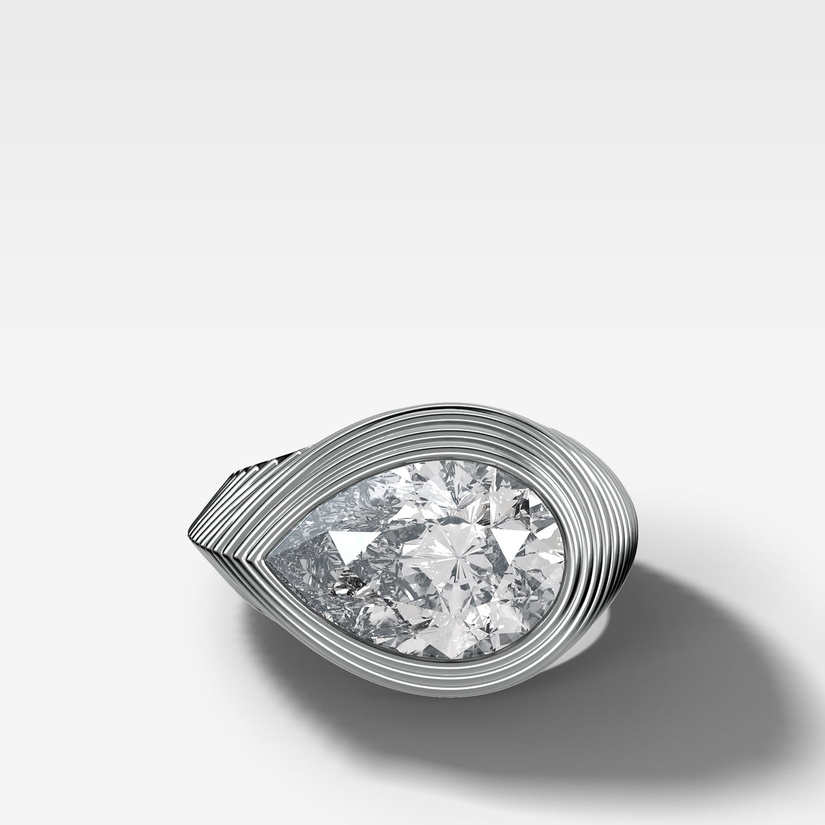 Ripple Solitaire Engagement Ring with East West Pear Cut Diamond