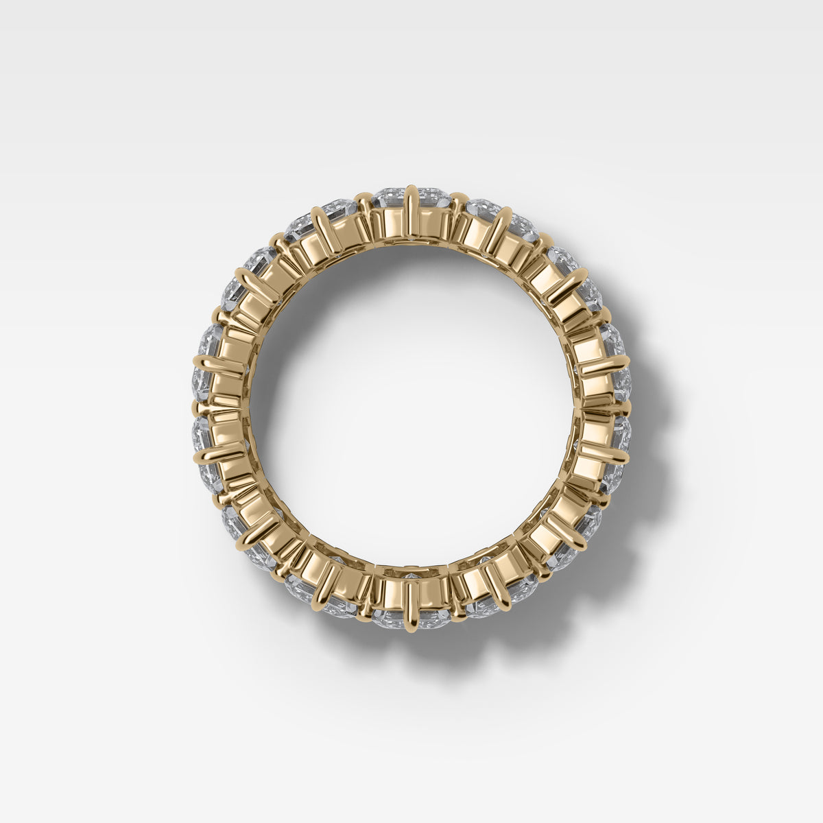 Compass-Set Eternity Band with Emerald Cut Diamonds