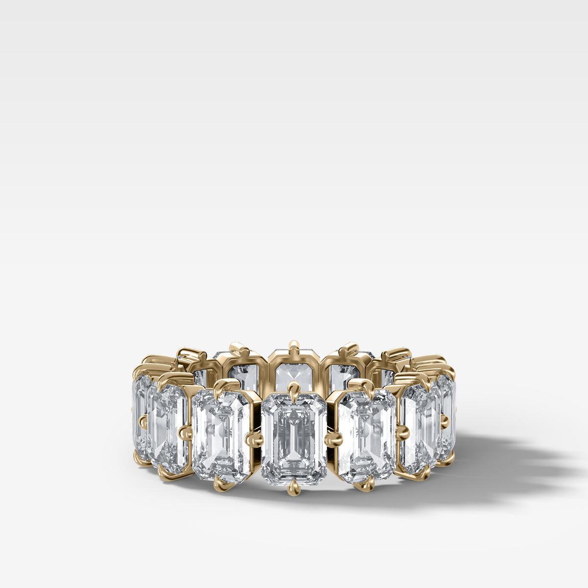 Compass-Set Eternity Band with Emerald Cut Diamonds