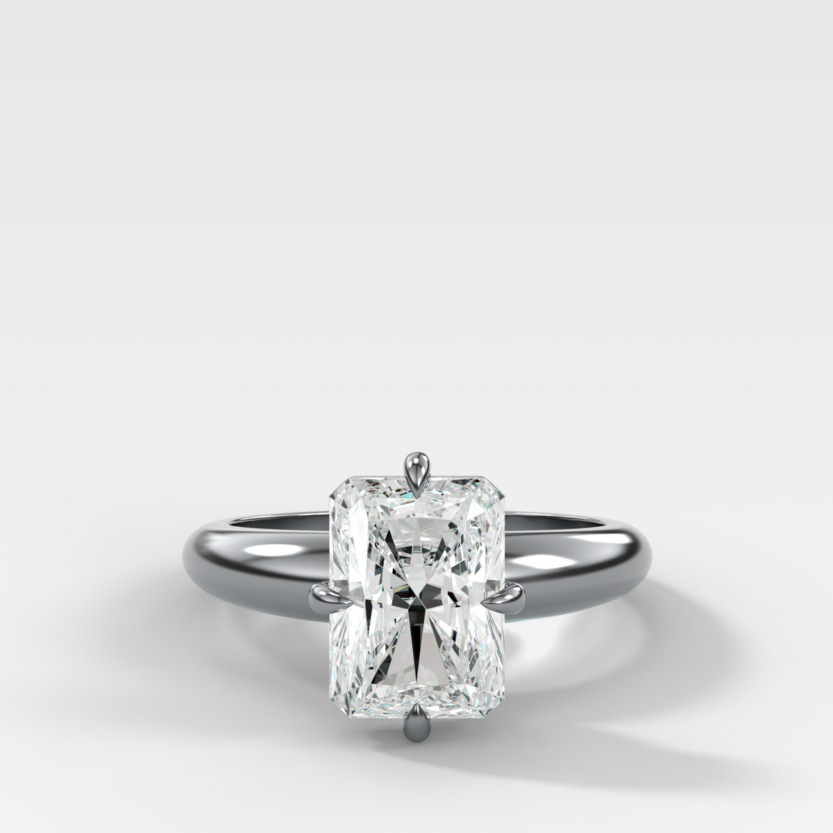 Compass Tapered Dome Engagement Ring With an Elongated Radiant Diamond