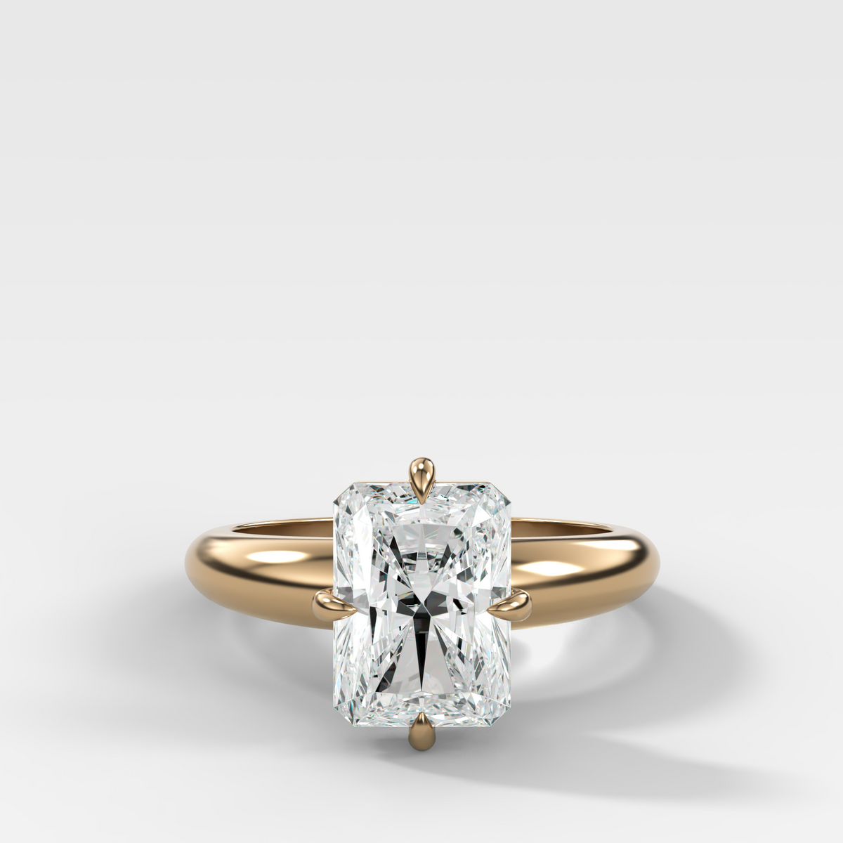 Compass Tapered Dome Engagement Ring With an Elongated Radiant Diamond
