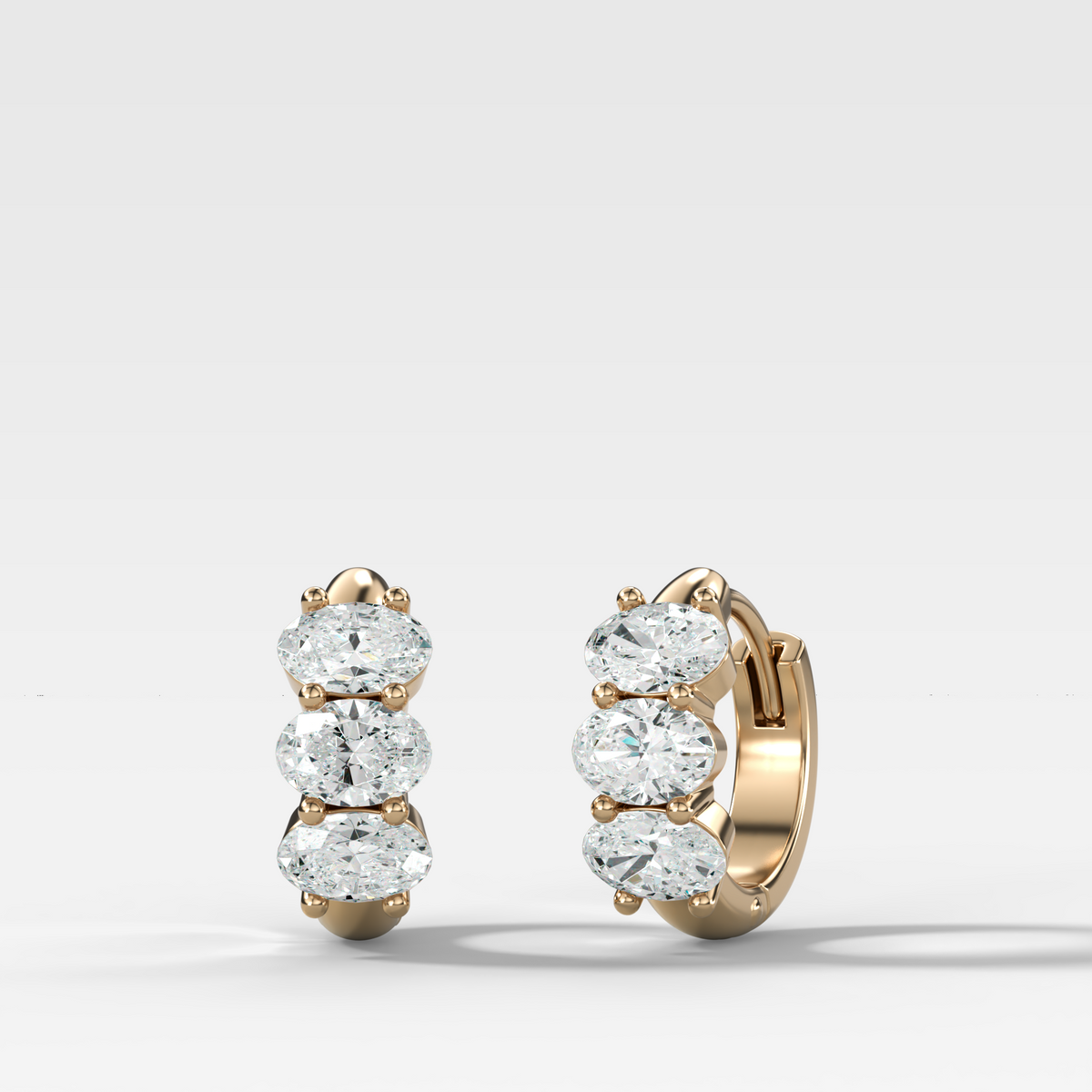 Jumbo Shared Prong Huggies with Oval Cut Diamonds