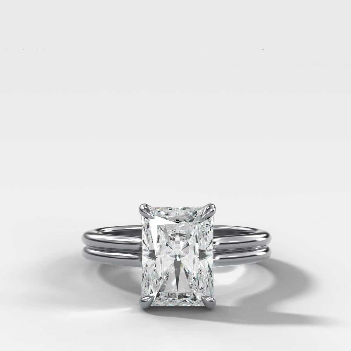 Double Row Solitaire Engagement Ring With Elongated Radiant Cut Diamond