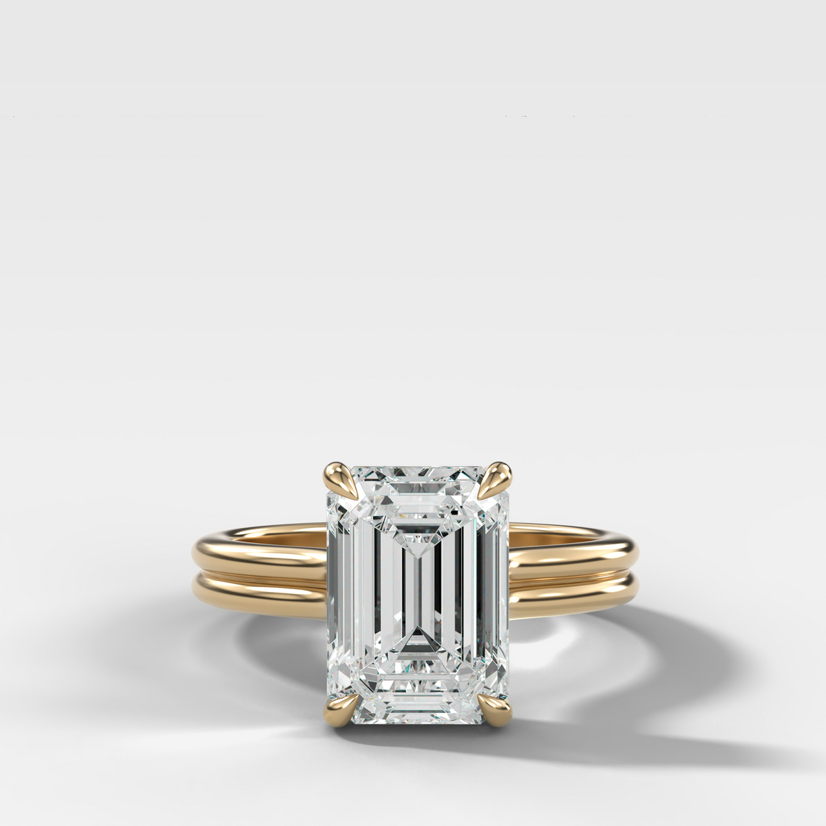 Double Row Solitaire Engagement Ring With Emerald Cut Diamond