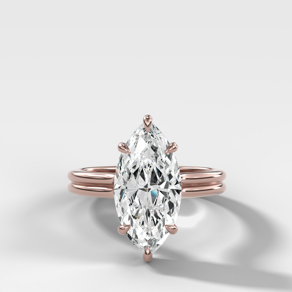 Double Row Solitaire Engagement Ring With Marquise Cut Diamond